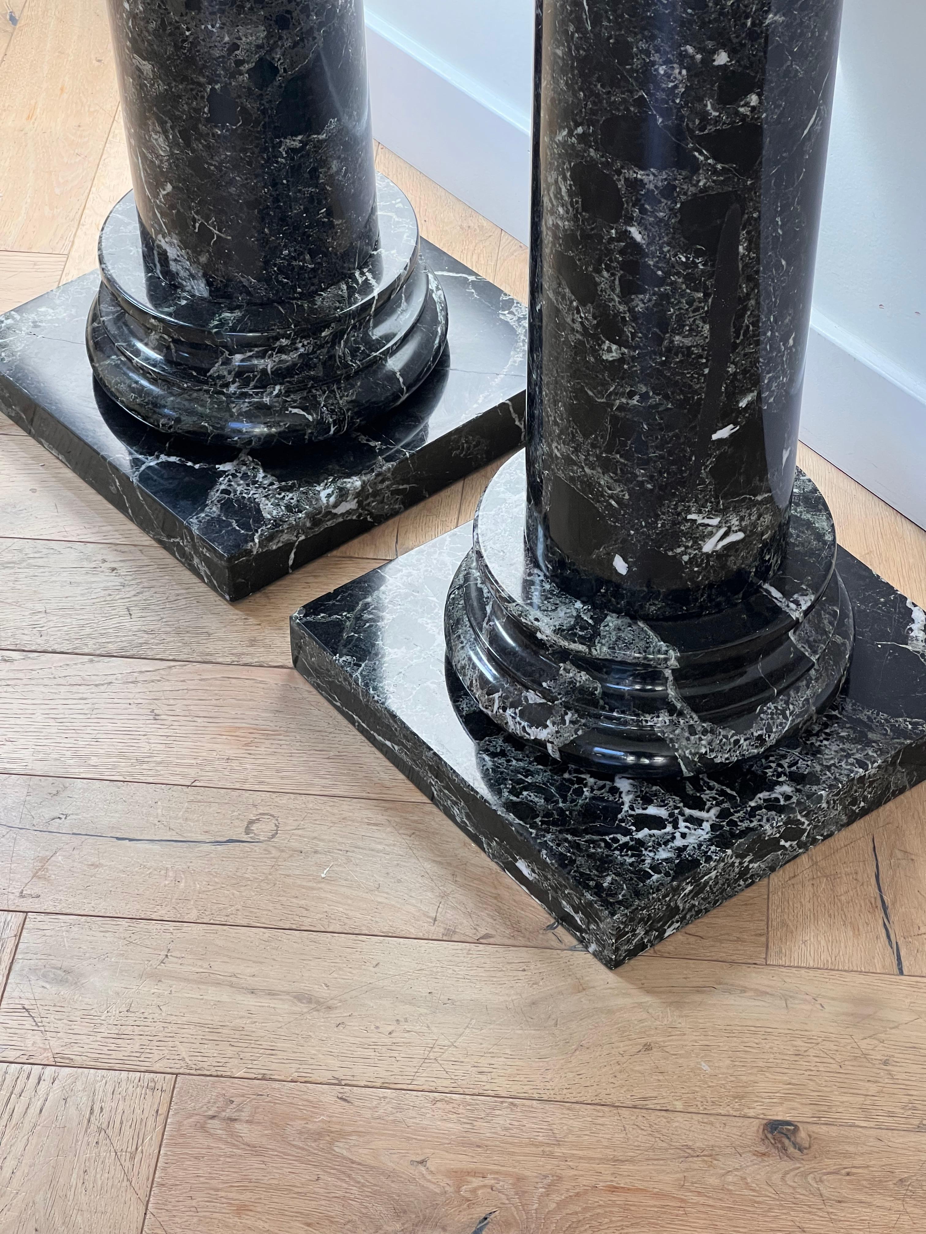 A pair of black marble pedestal columns, late 20th century 8