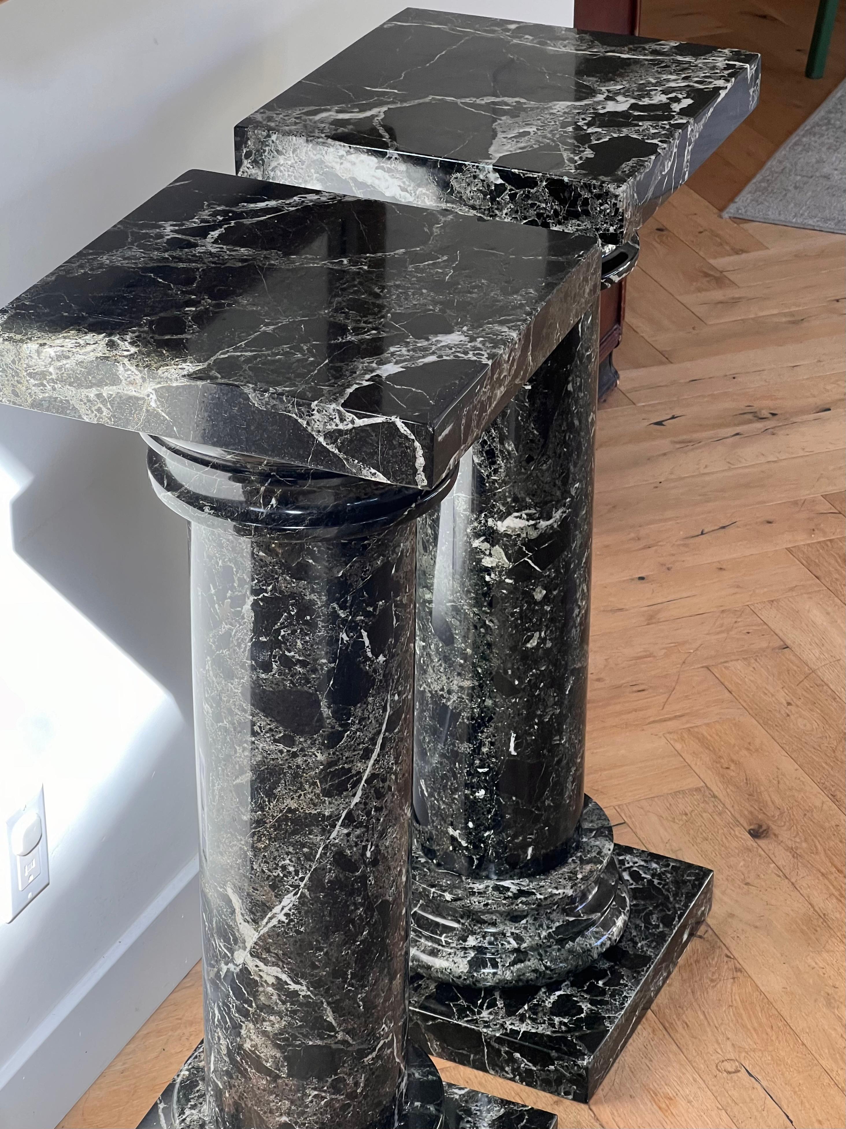 A pair of black marble pedestal columns, late 20th century 9