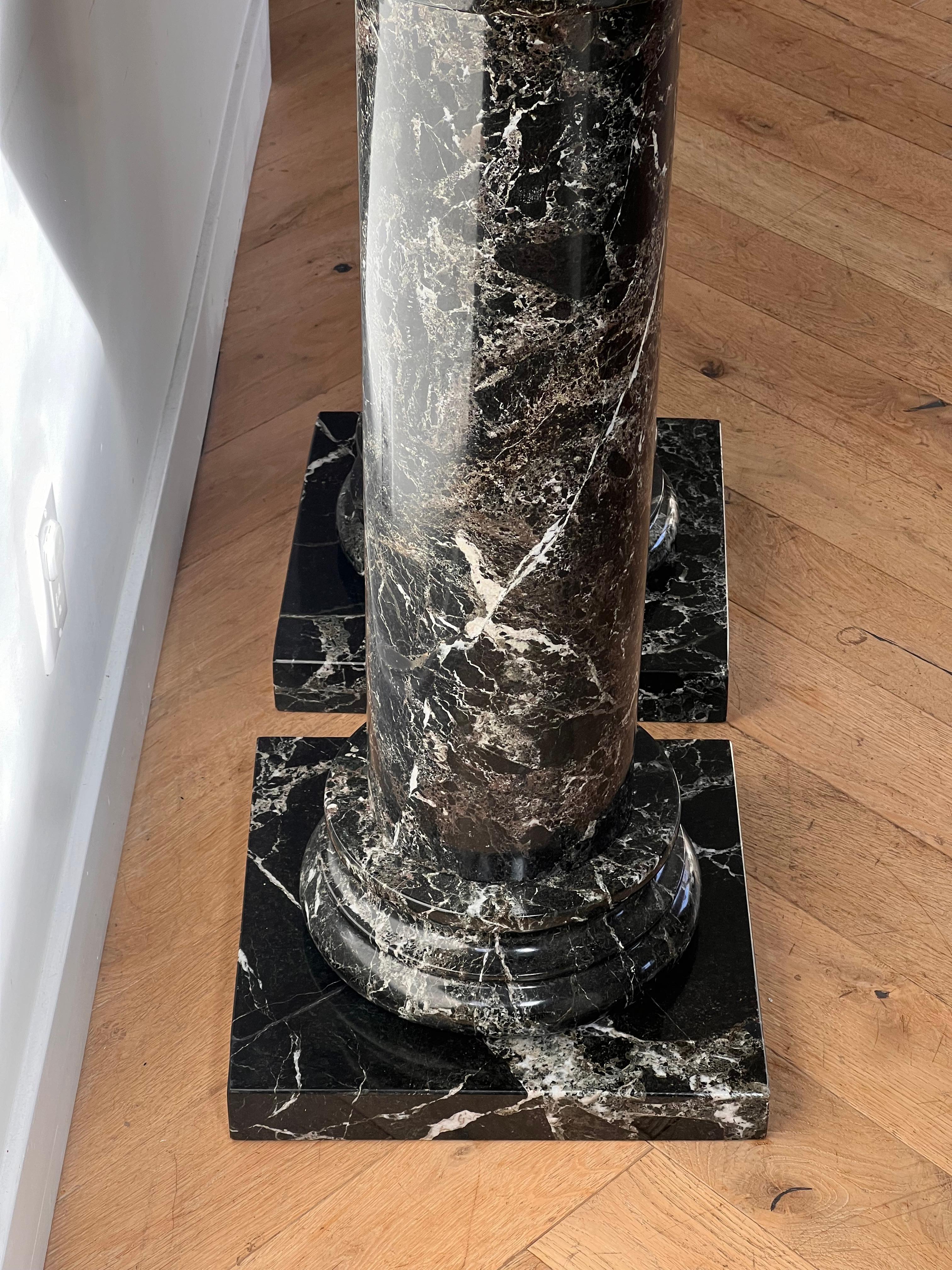 A pair of black marble pedestal columns, late 20th century 10