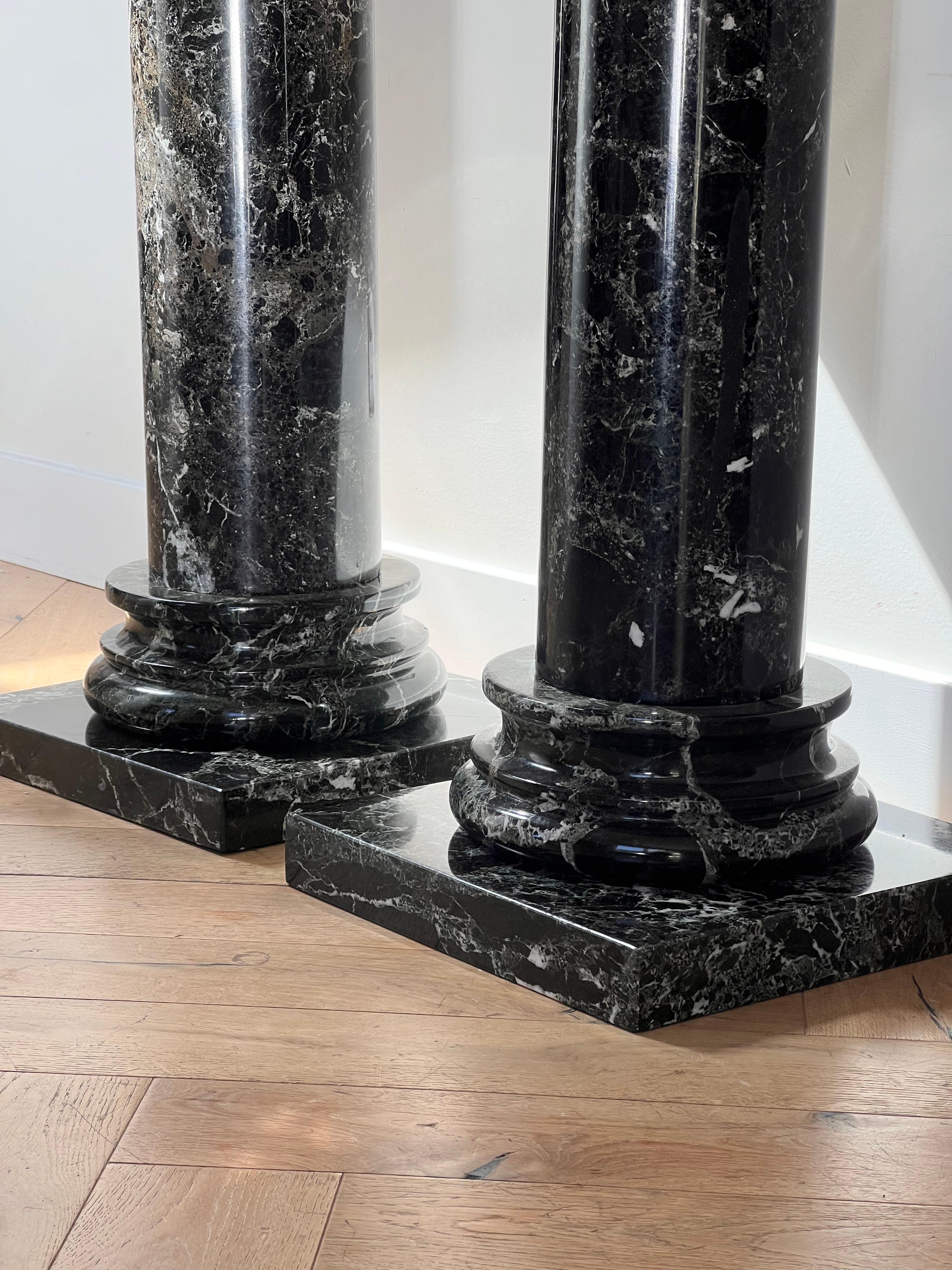 A pair of black marble pedestal columns, late 20th century In Good Condition In View Park, CA