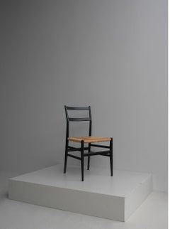 A pair of Black Wooden Gio Ponti Leggera Chairs with Cord Seats, Italy 1951