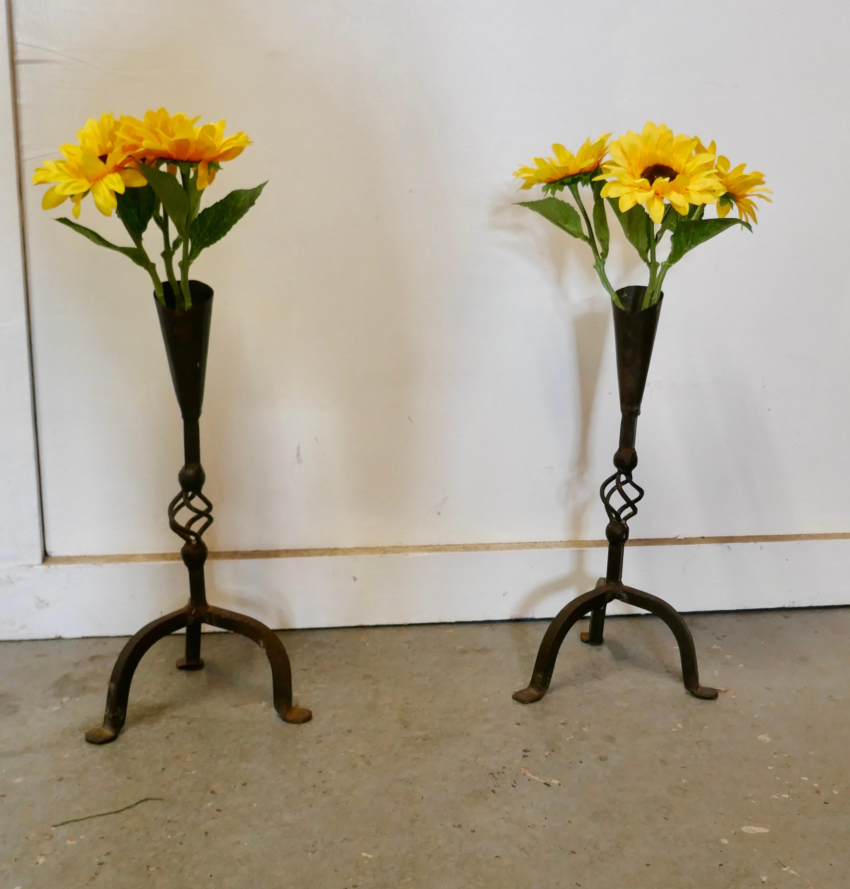 A pair of Blacksmith Made Gothic wrought iron candle sticks


This is a very unusual pair of Gothic wrought iron candle sticks or vases, these are blacksmith made, they stand on 3 feet which have a twisted decoration
An unusual pair, they