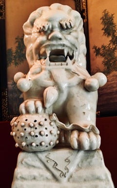A Pair of Blanc de Chine Ceramic Foo Dogs, Ca. 1840