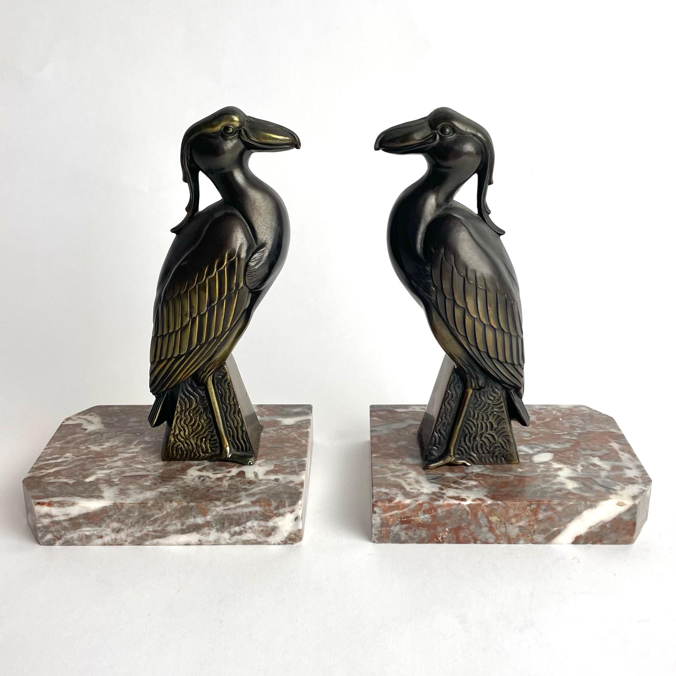Patinated A pair of Bookends with birds signed Jamar in period Art Deco from the 1930s For Sale