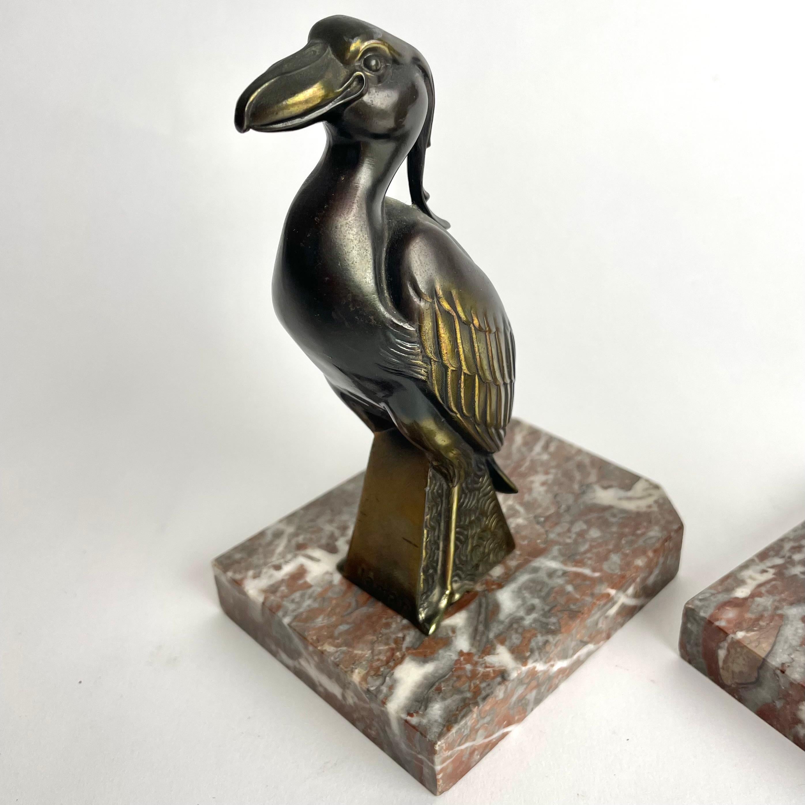 Metal A pair of Bookends with birds signed Jamar in period Art Deco from the 1930s For Sale