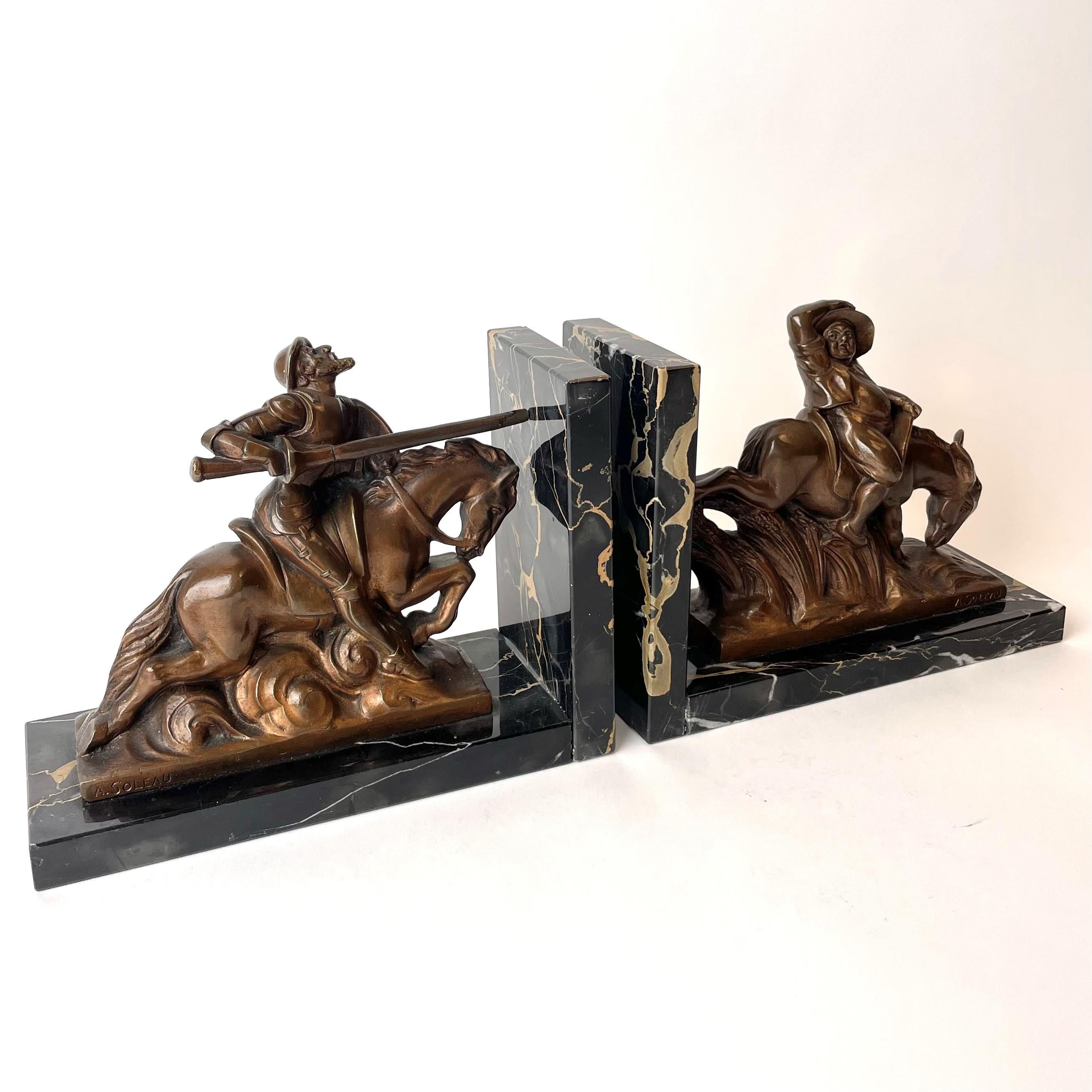 A rare pair of bookends with scenes from Don Quixote. Made in France during the 1930s and signed A. Soleau. 

Measures : Total width 2 * 22 cm = 44 cm. (a pair)

Wear consistent with age and use.