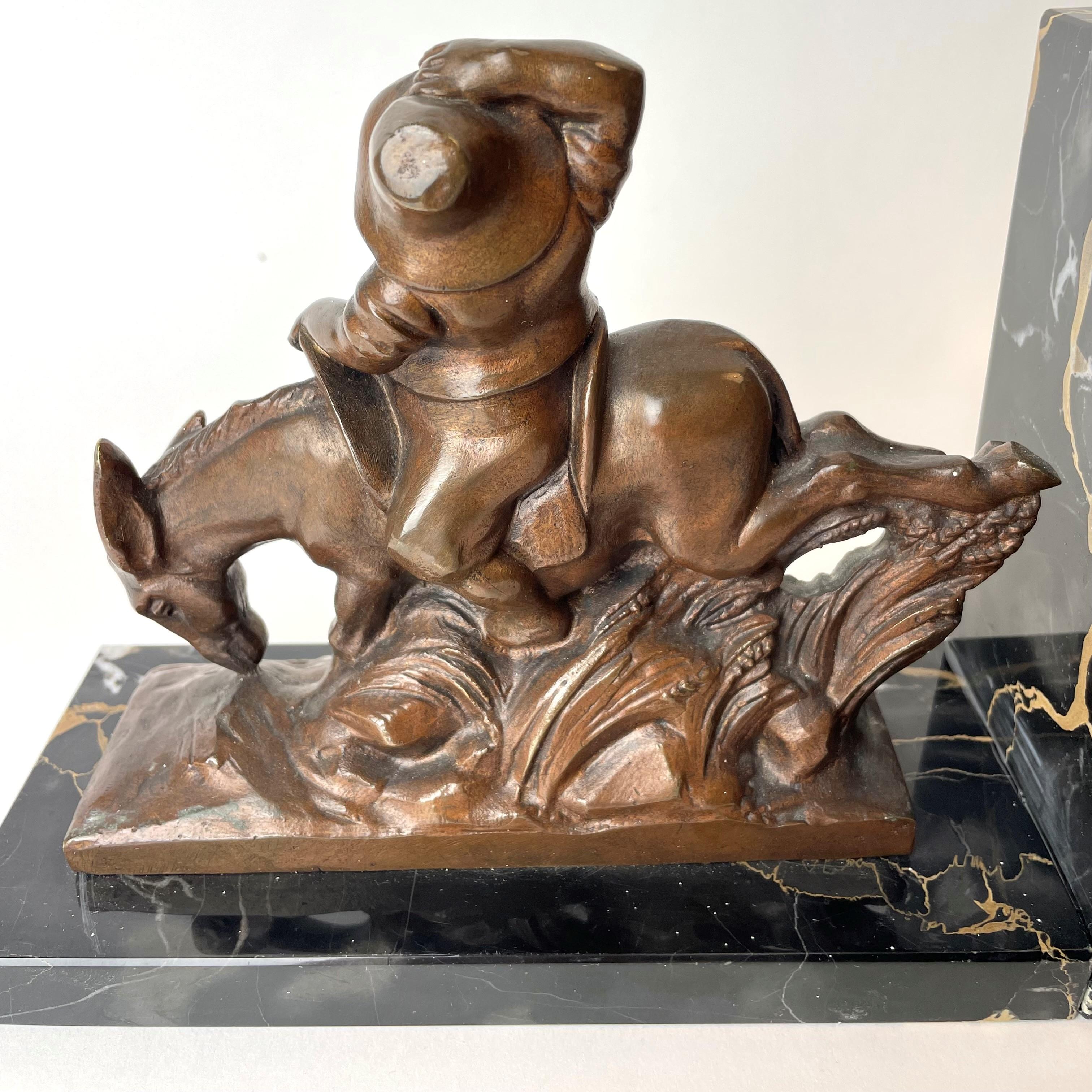 Pair of Bookends with Scenes from Don Quixote, Signed A. Soleau. 1