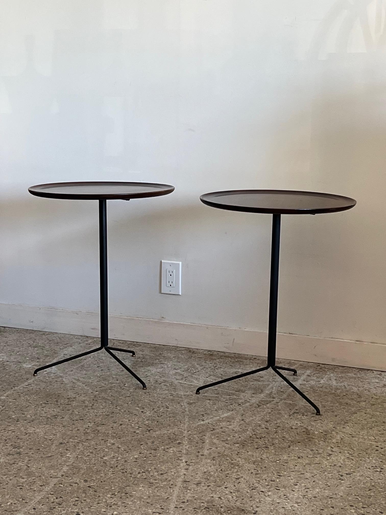 A pair of elegant side tables or gueridons. Tripod bases with pie shaped tops.