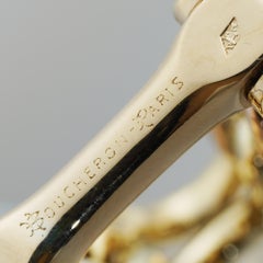 Ein Paar Boucheron-Manschettenknöpfe aus Gold und Saphir mit Steigbügeln