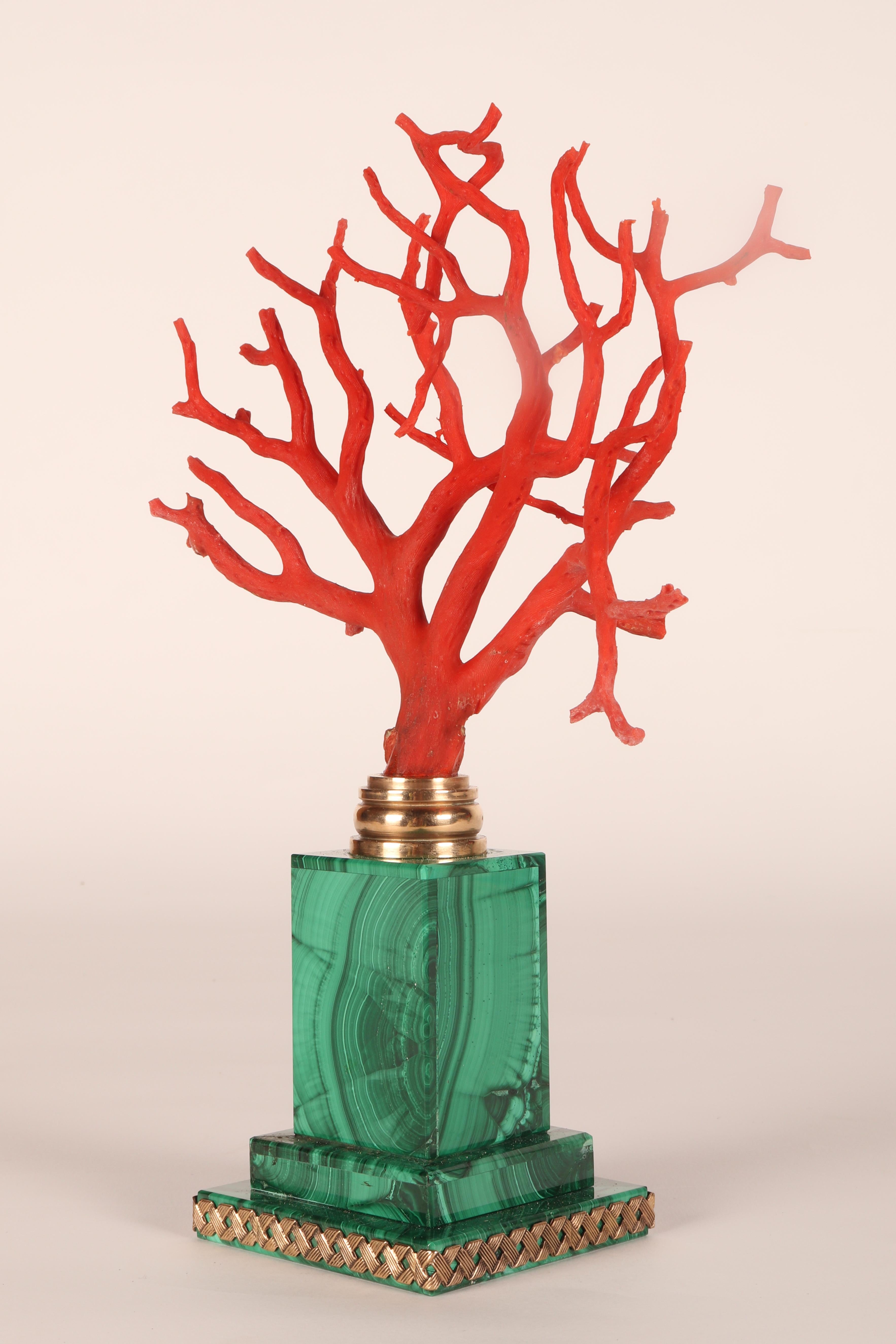 A pair of branches of Mediterranean red coral, on malachite bases, Italy 1880s. 1