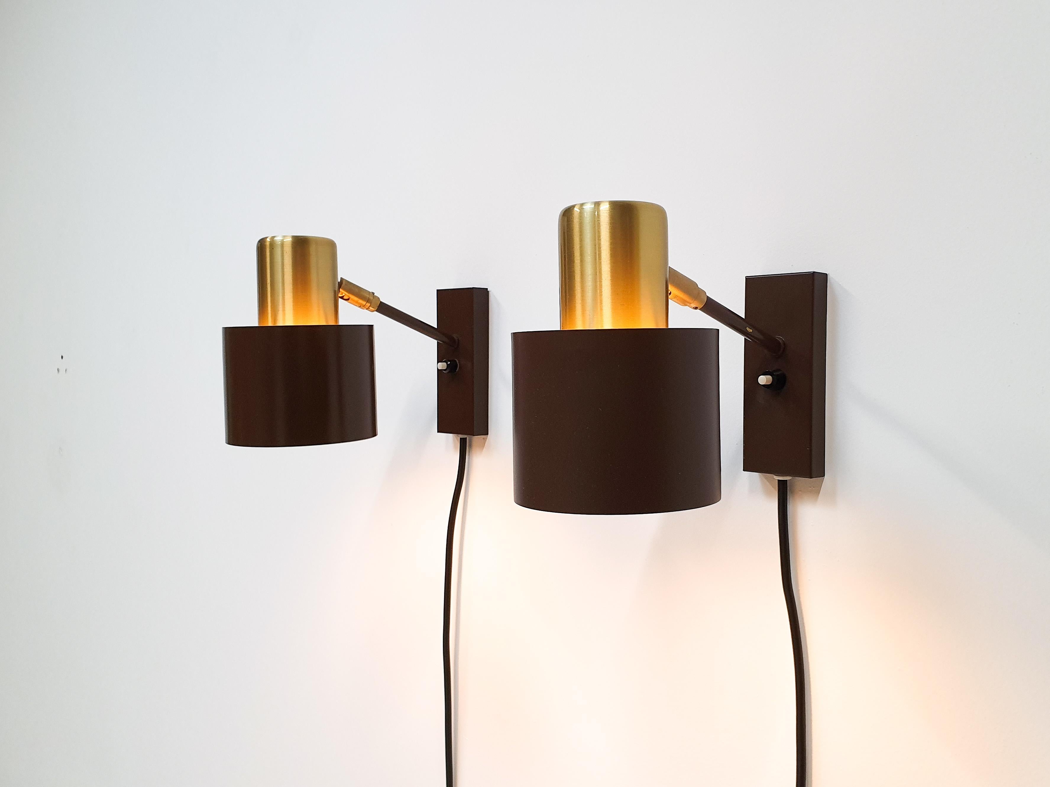 A set of two model Alfa wall sconces designed by Jo Hammerborg in 1966 and produced by Fog & Mørup in Denmark.
 
Made of brass, adjustable and have a distance of 24cm to the wall. 

In 1957 Hammerborg became head of design at Fog & Mørup. His