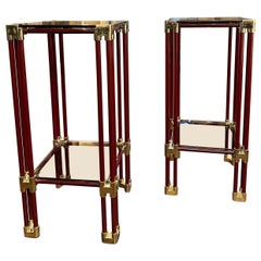 A Pair Of Brass and Burgundy Lacquered Two Tier Side Tables