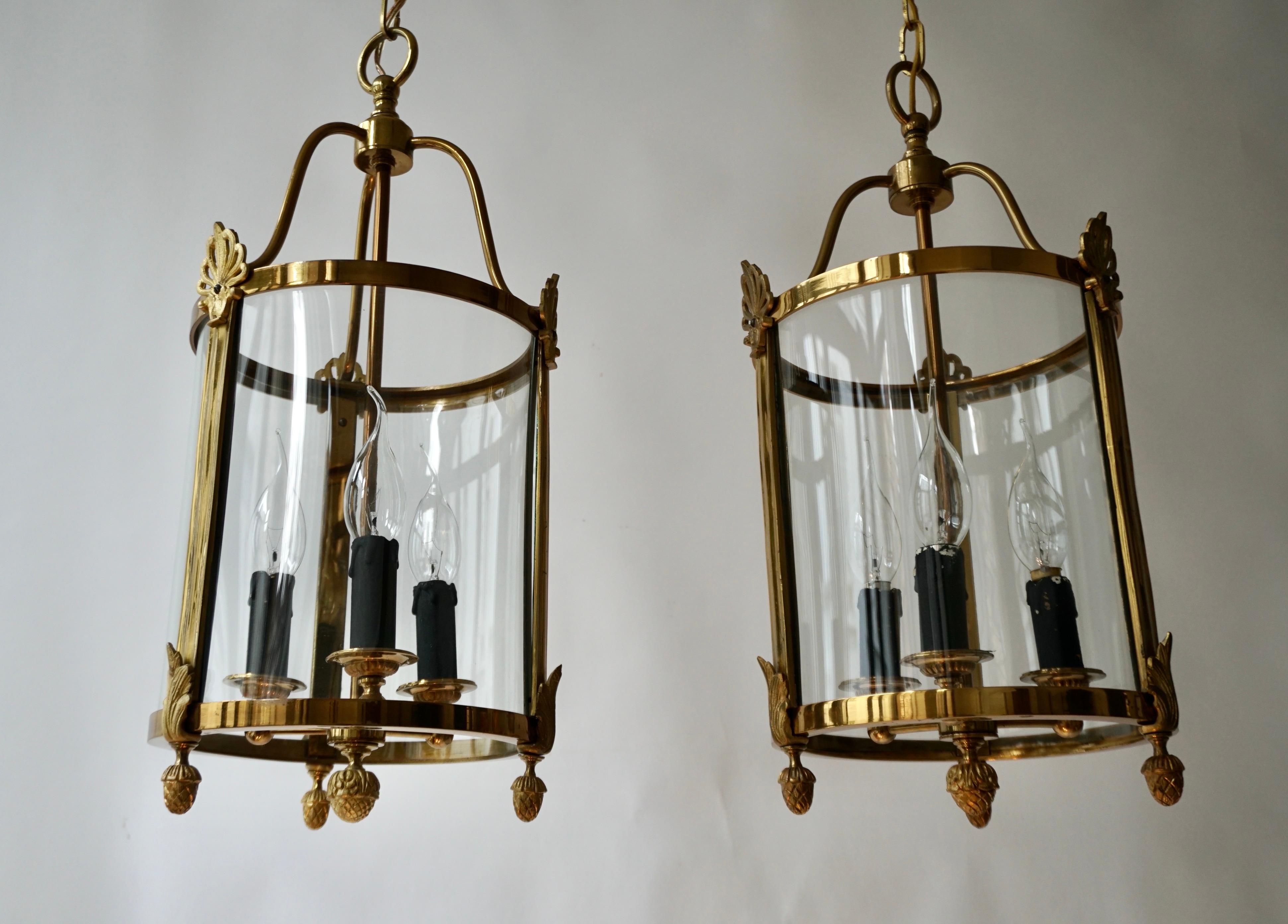 A Pair of Brass and Glass Three Light Lanterns For Sale 4