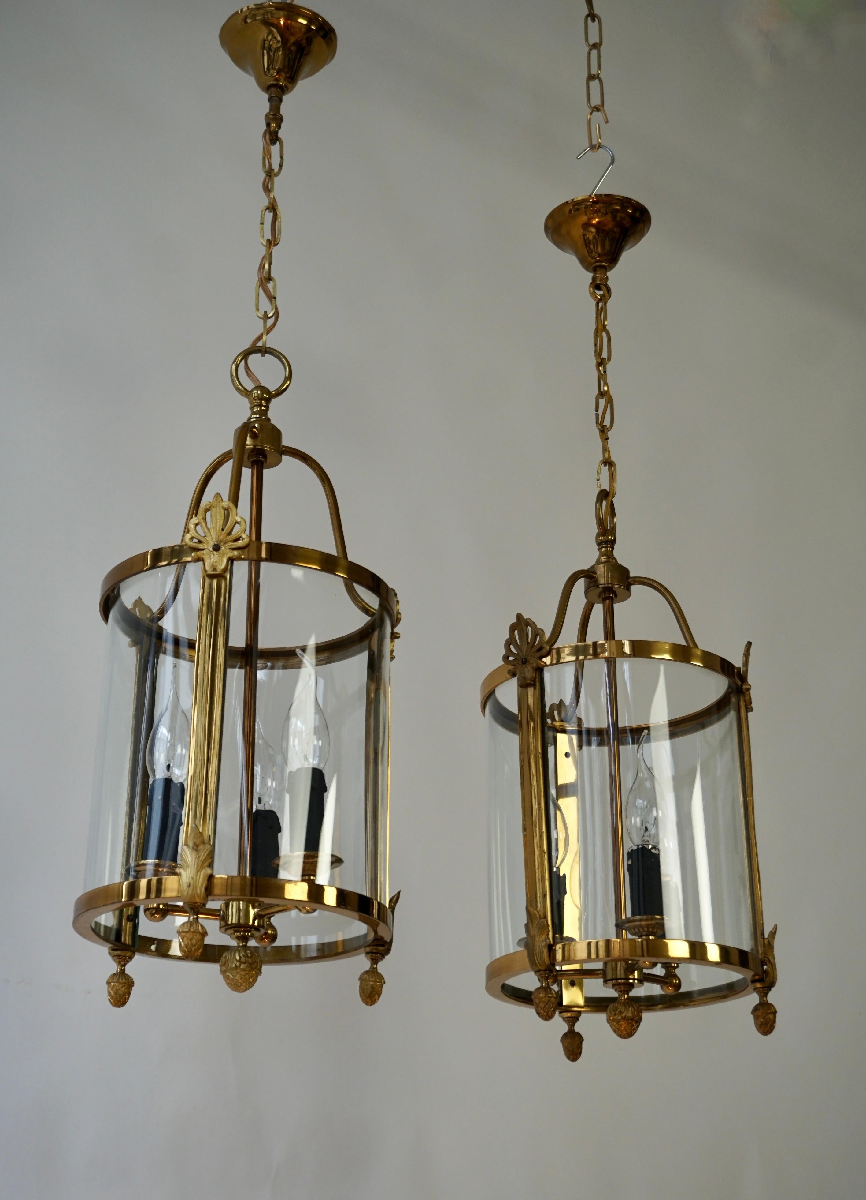 A Pair of Brass and Glass Three Light Lanterns For Sale 2