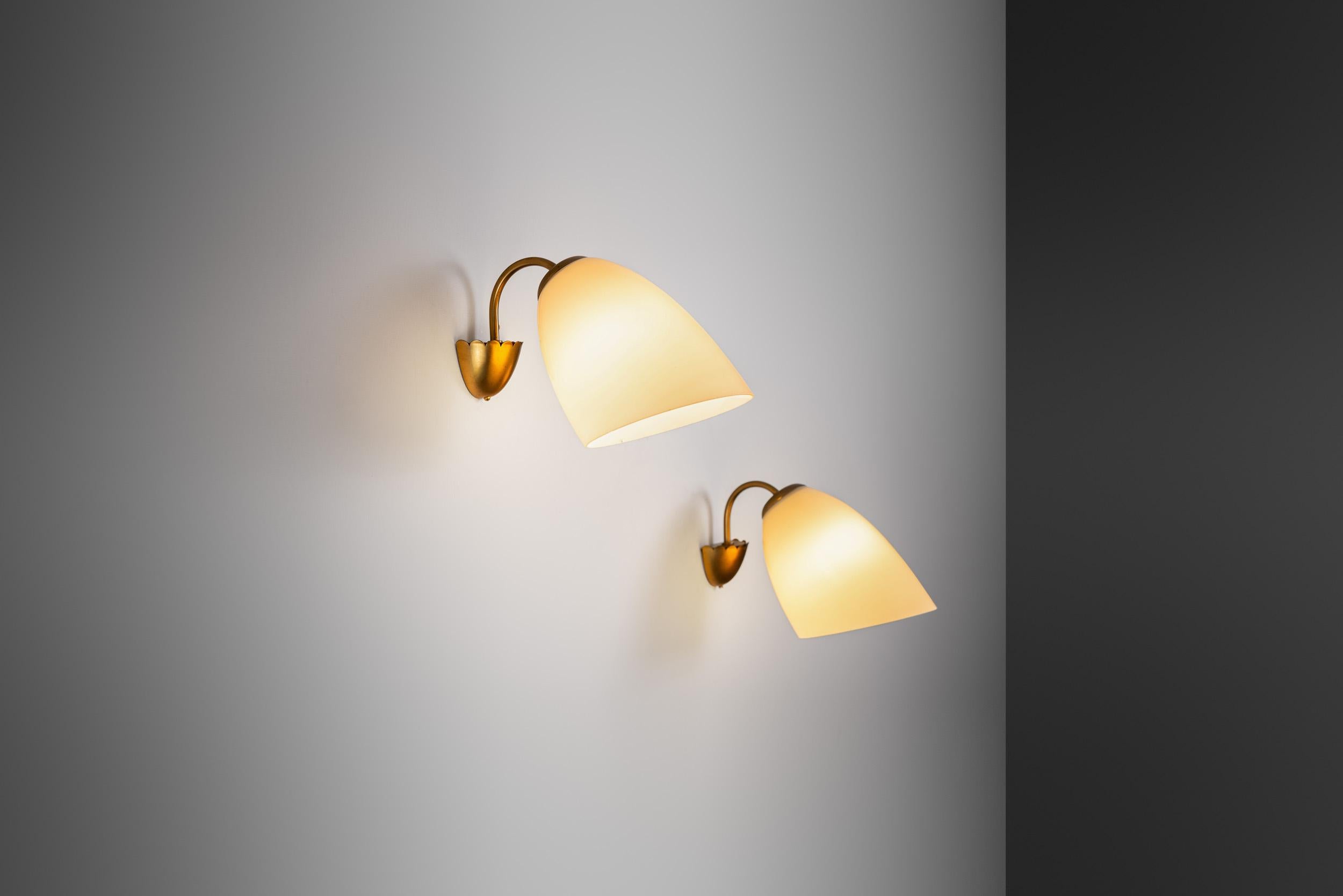Mid-Century Modern A Pair of Brass and Opal Glass Wall Lamps, Finland ca 1960s