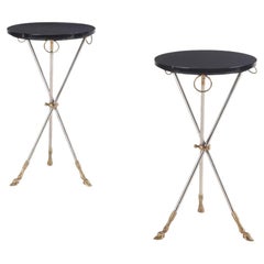 Une paire de tables d'appoint en laiton et acier, à la manière de la Maison Jansen. C. 1970.