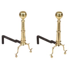 A Pair of Brass Ball Andirons on Cannon Barrel Shafts A Pair of Brass Ball Andirons on Cannon Barrel Shafts