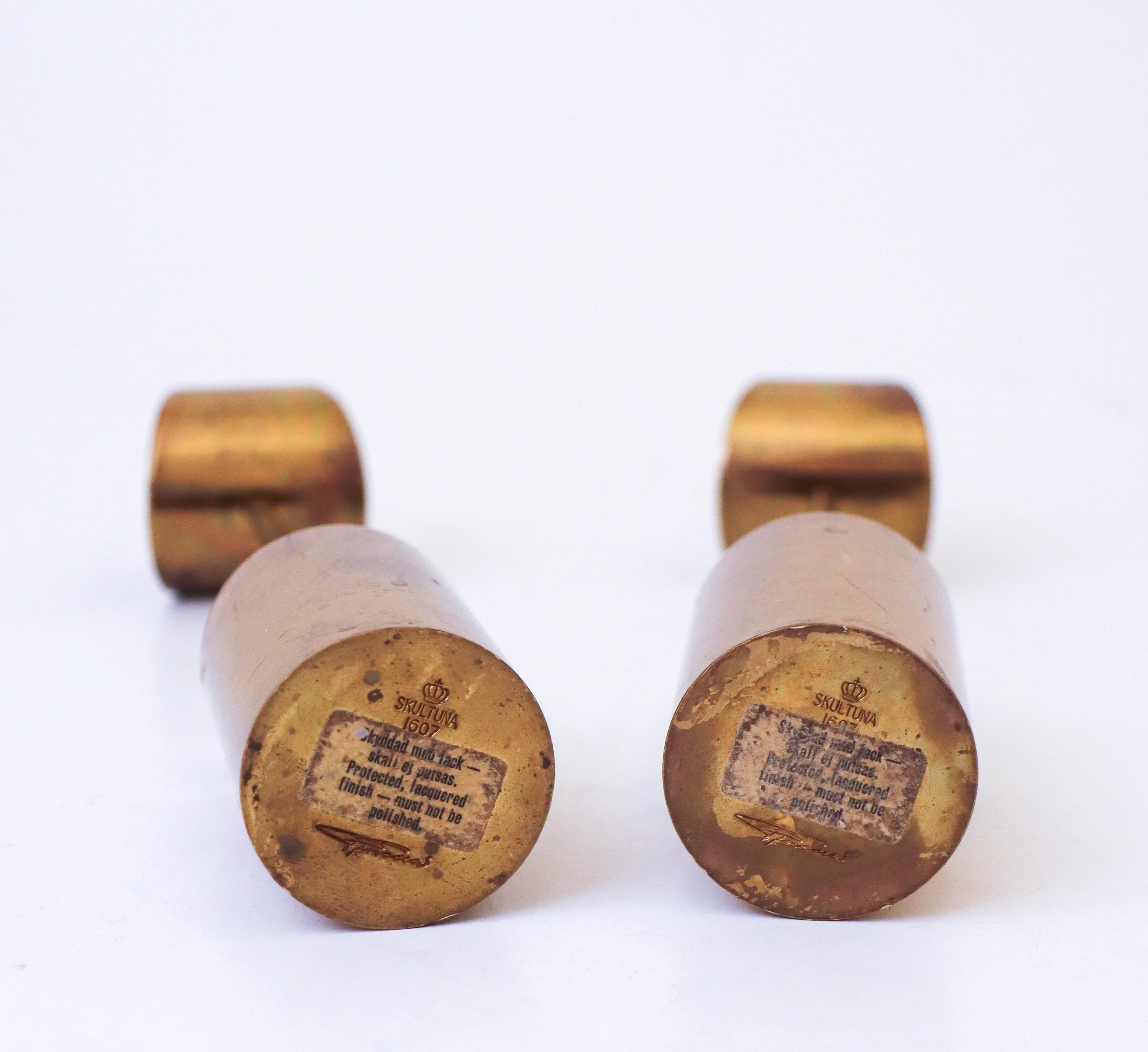 A pair of Brass Candlesticks - 