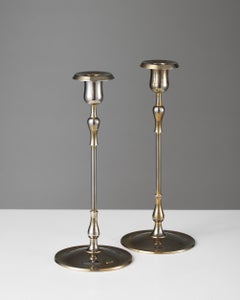 A pair of brass candlesticks designed by Gunnar Ander, Sweden, 1950s
