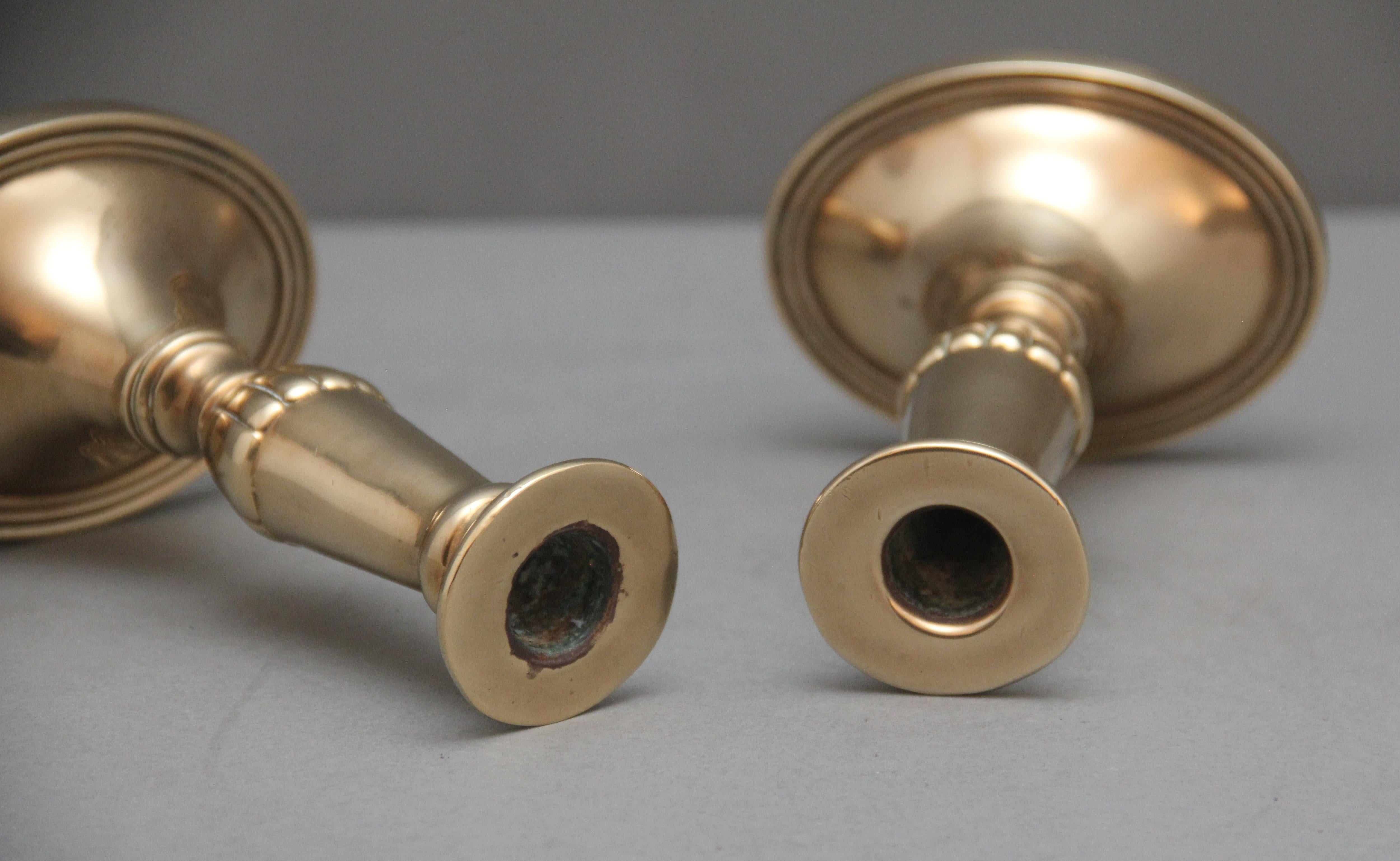 Brass A pair of brass Georgian candlesticks For Sale