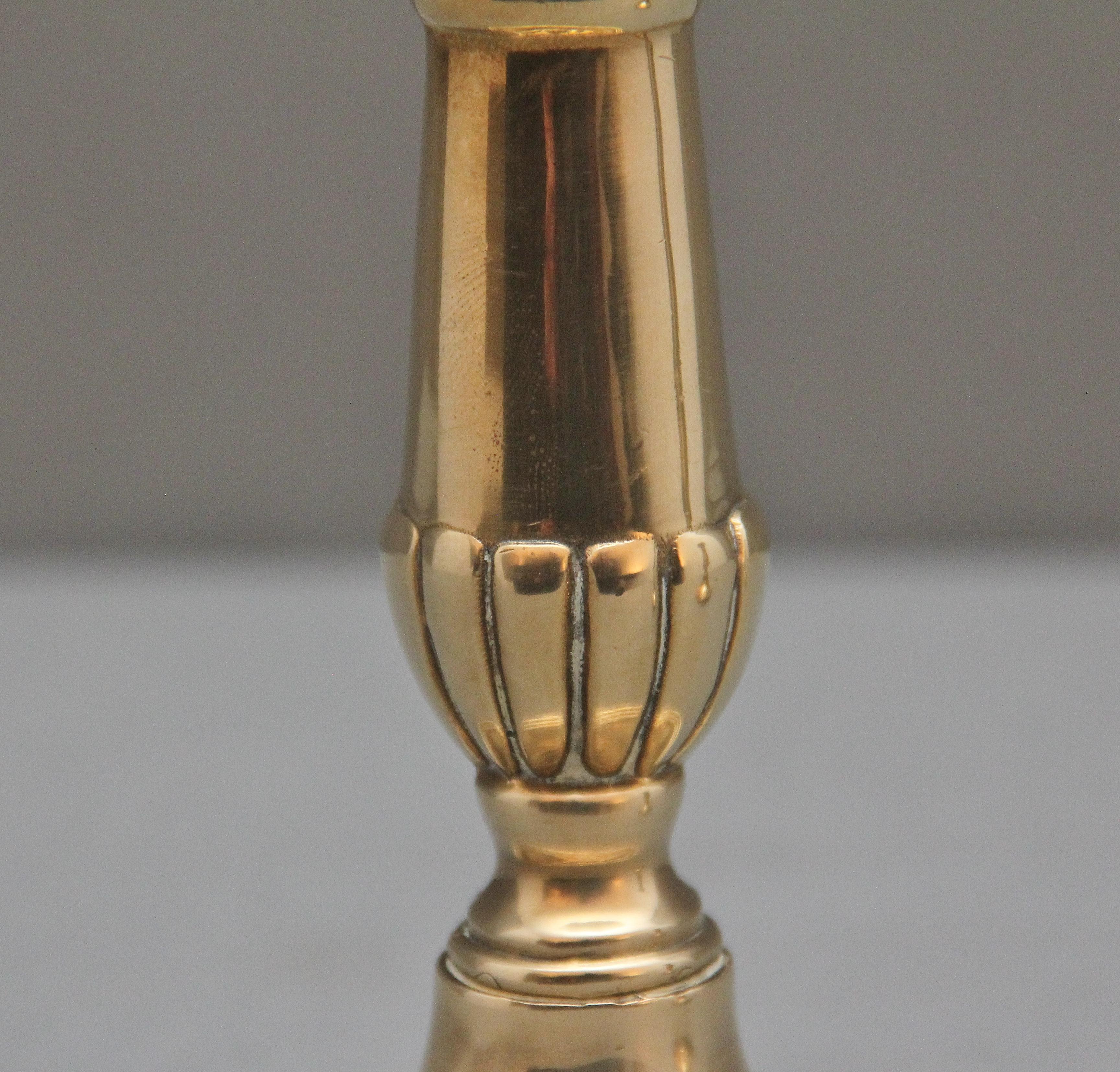 A pair of brass Georgian candlesticks For Sale 2