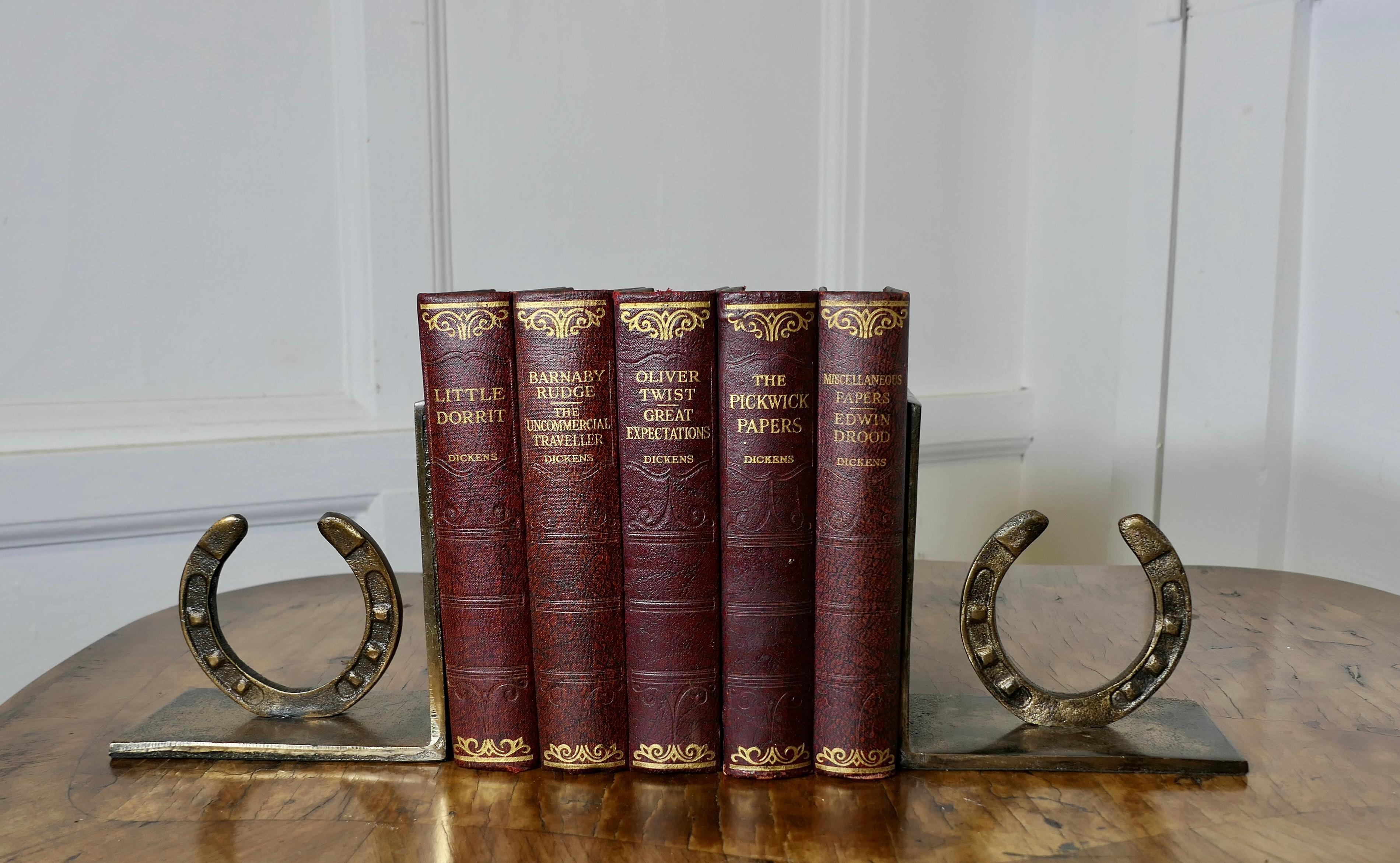 A Pair of Brass Horse Shoes Bookends  

A very attractive set, the ends are made in brass on a horse riding theme 
The bookends are 3 wide, 7” high and 5.5” deep
ZX140