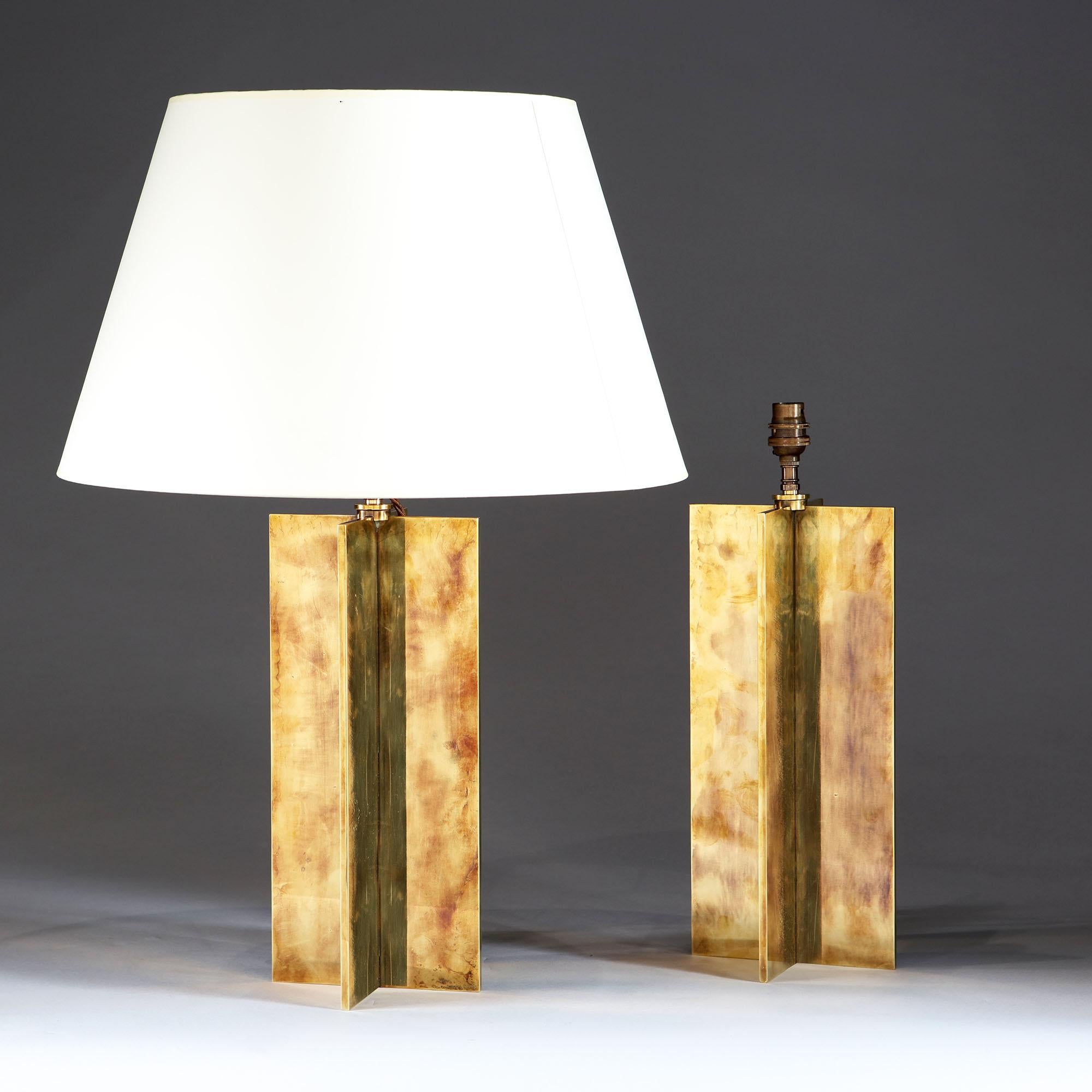 English A Pair of Brass Patinated X Form Lamps For Sale