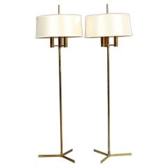 Pair of Brass Standard Lamps on a Three-Star Base