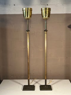 A Pair of Brass Torcheres Ca' 1950's
