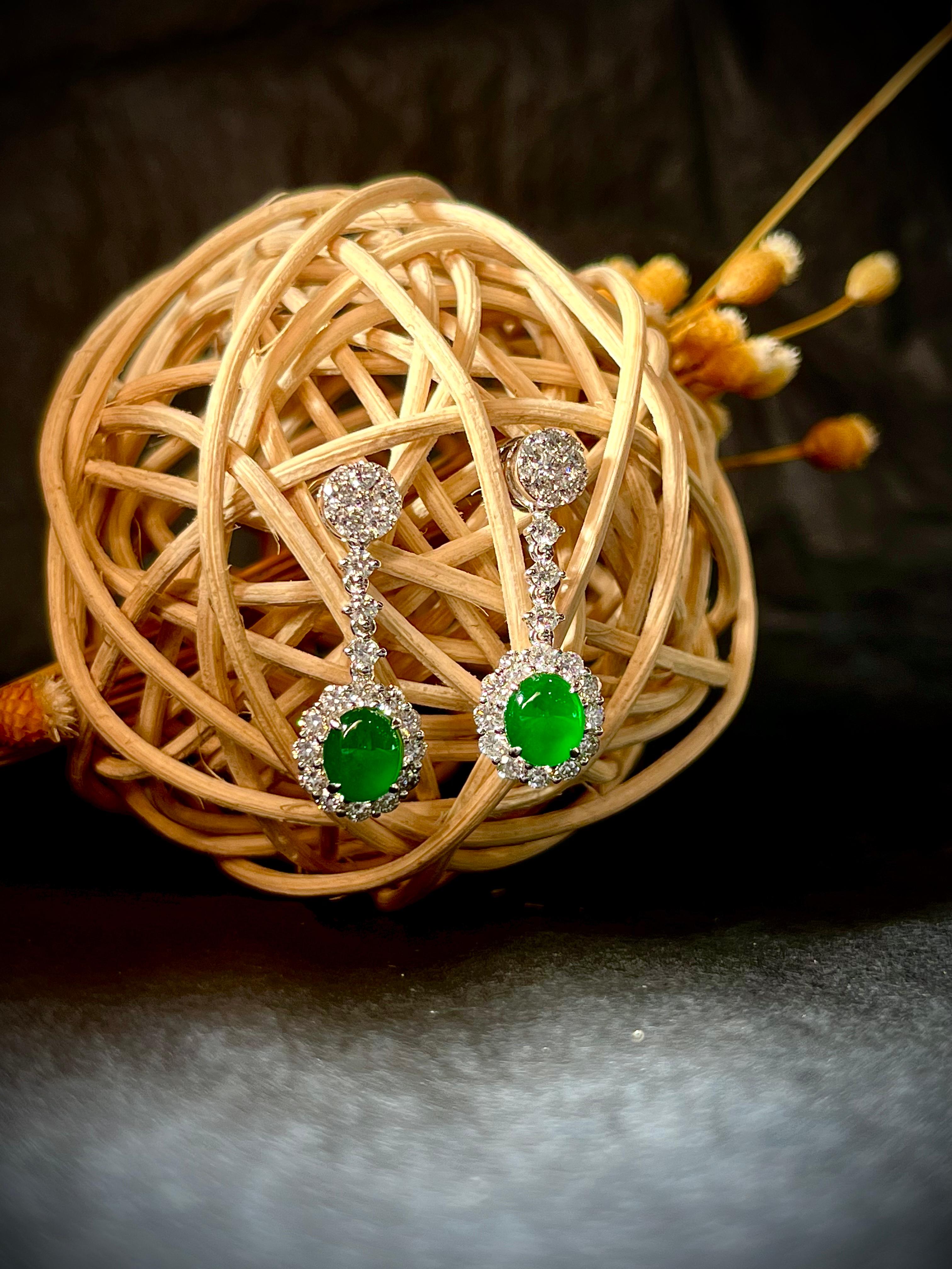 Contemporary A Pair of  Bright Green Jadeite Cabochon and Diamond Earrings in 18 Karat Gold For Sale