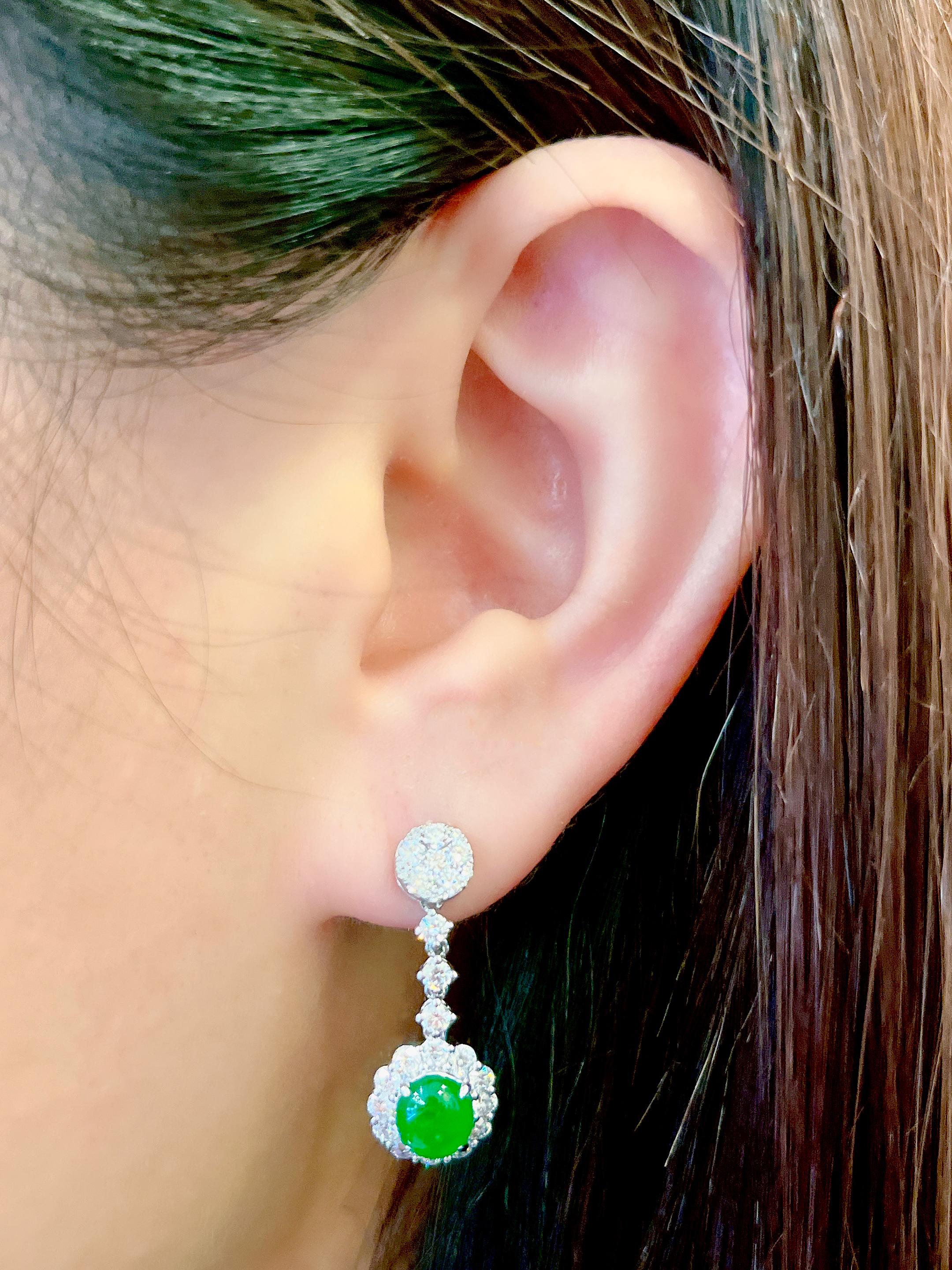 A Pair of  Bright Green Jadeite Cabochon and Diamond Earrings in 18 Karat Gold For Sale 1