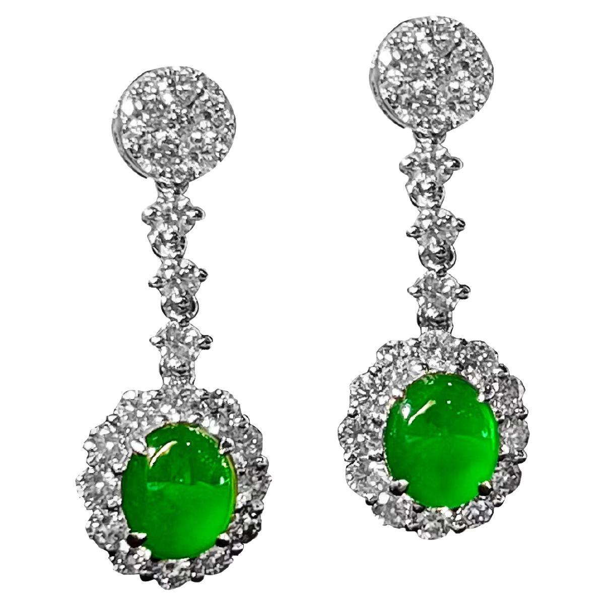 A Pair of  Bright Green Jadeite Cabochon and Diamond Earrings in 18 Karat Gold