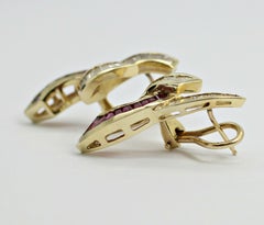 Pair of Brilliant Ribbon Diamond and Ruby Earrings Made of 14 Karat Yellow Gold