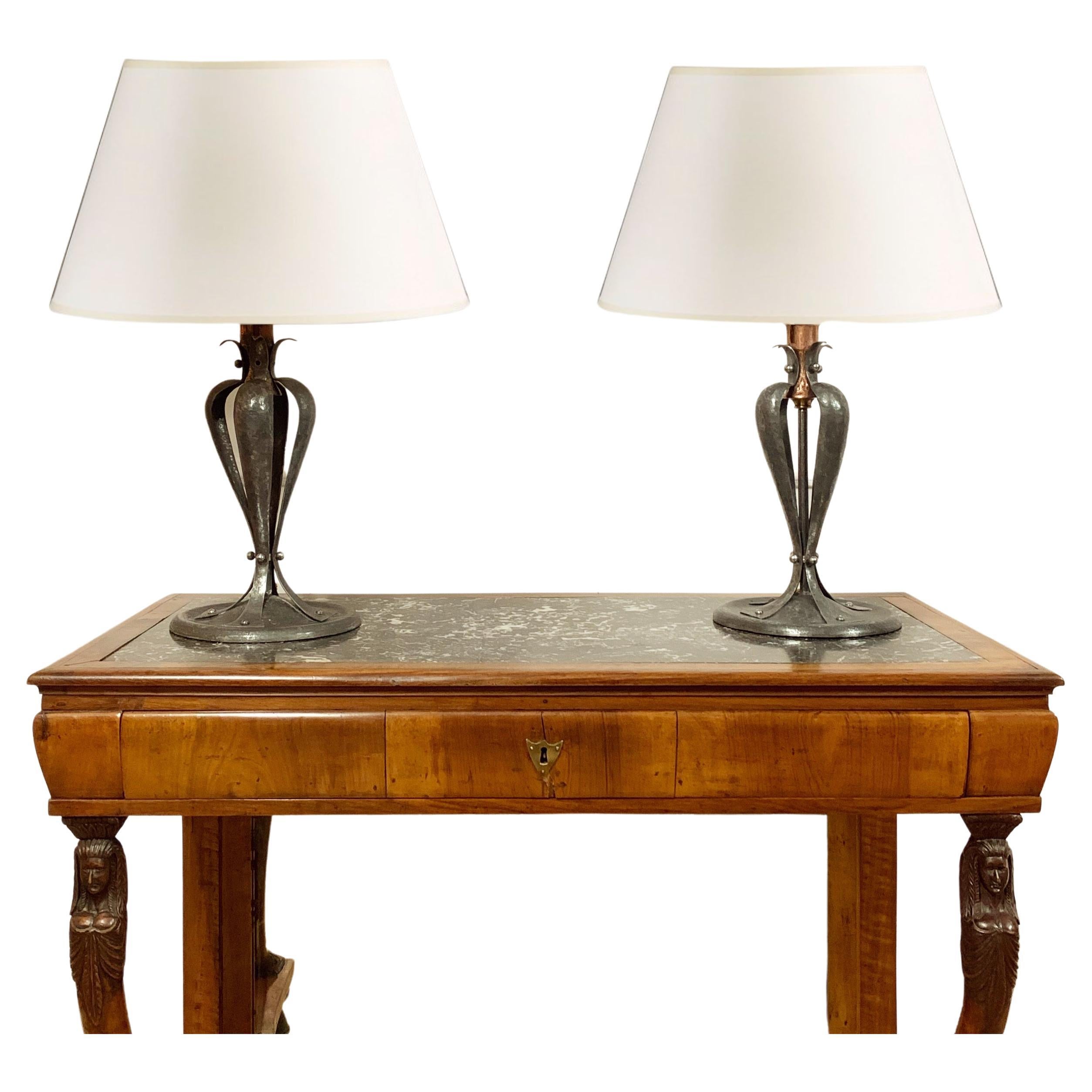 A Pair of British Designed Copper and Steel Table Lamps