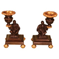Pair of Bronze and Ormolu Regency Period China-Men Candlesticks