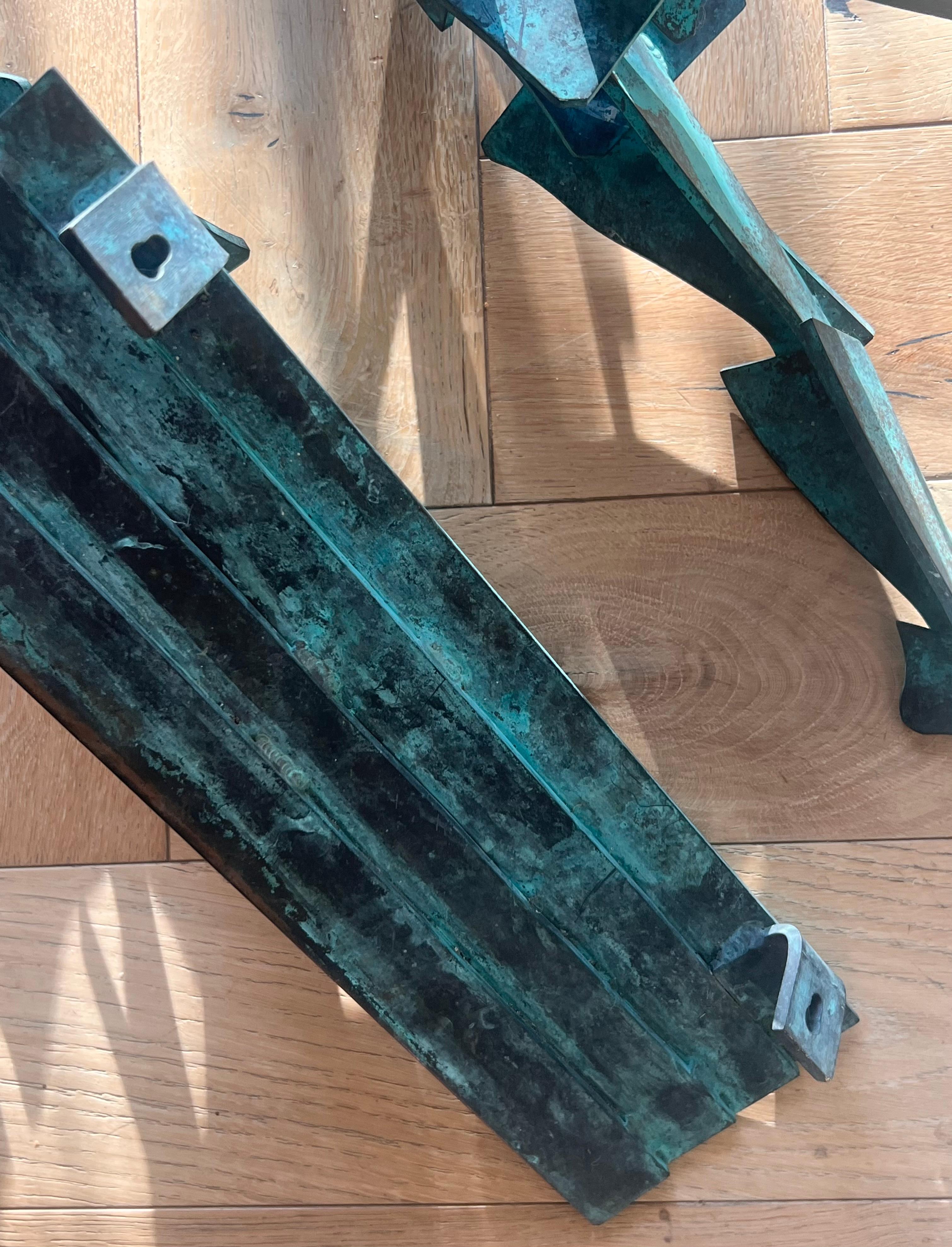 Hand-Crafted A pair of large bronze figurative wall hanging sculptures, 20th century For Sale