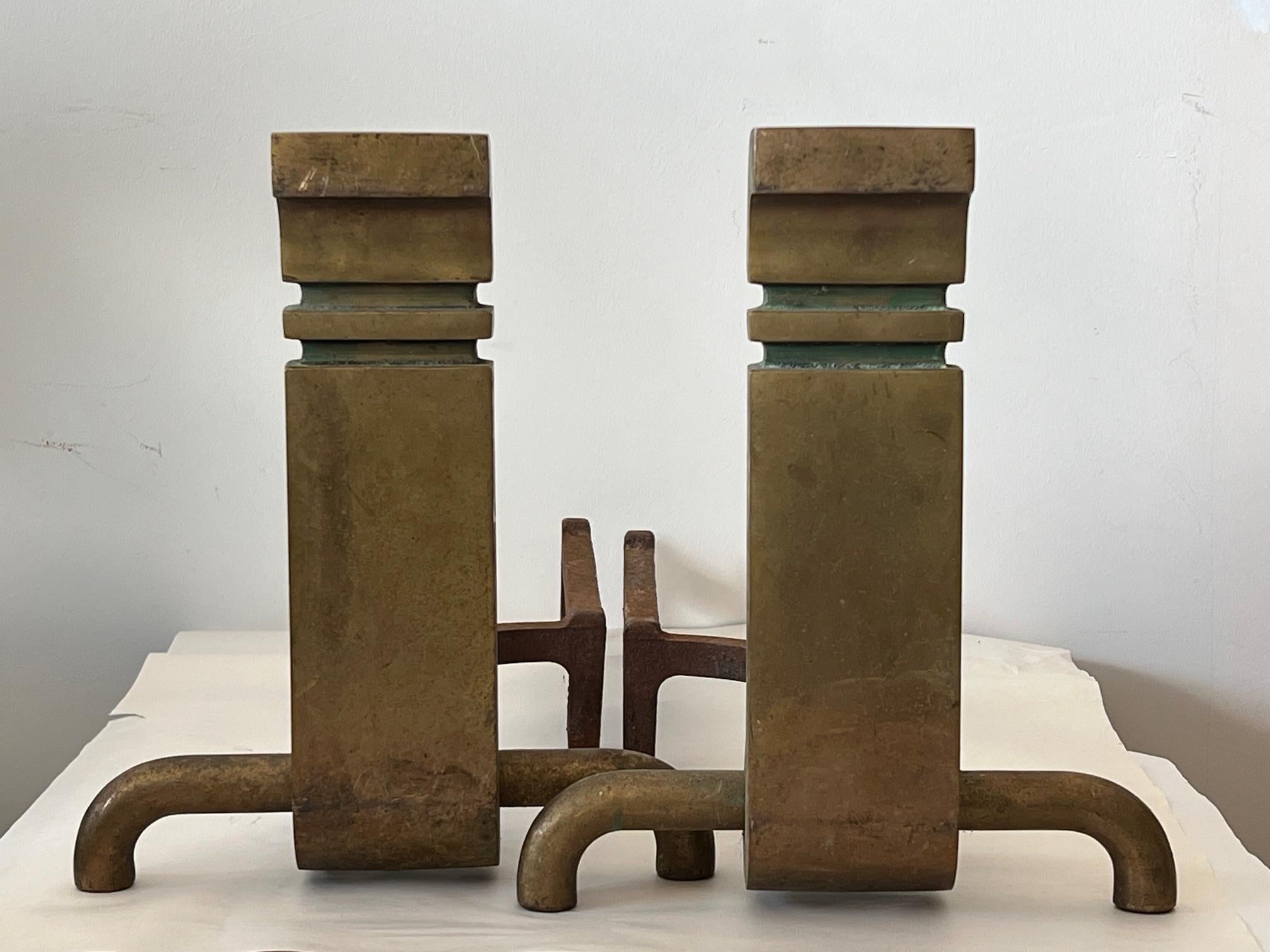 A pair of unusual, modernist andirons by Wah Chang, signed. Made ca '1950 the bases are stamped Van Nuys, California. A note about the designer. 