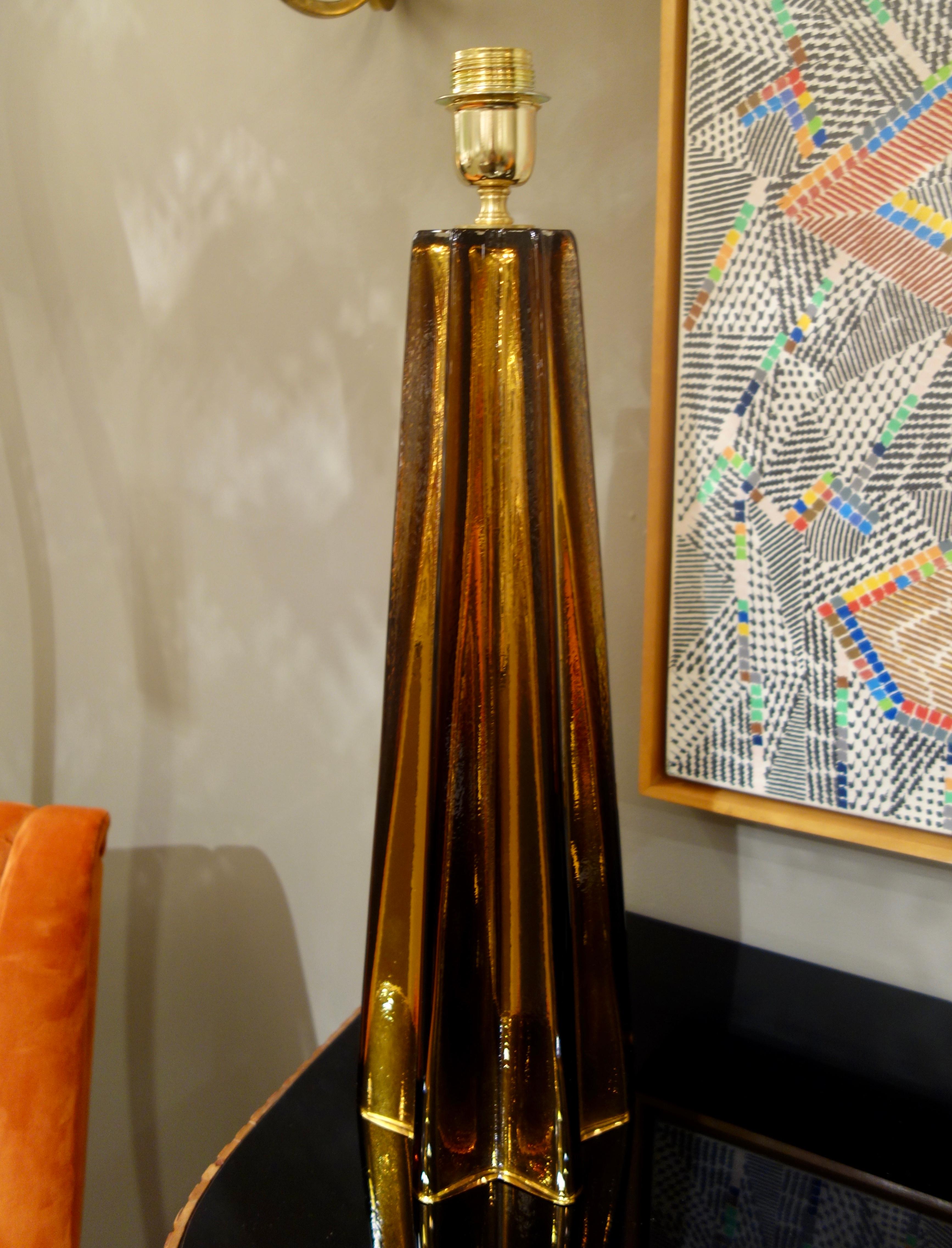 A pair of bronze Murano mercury glass lamps with highly reflective surfaces enhanced by the deep fluting which forms a star shaped base signed by master glass maker, Alberto Donà. Upon purchase, the lamps will be wired for the American market.