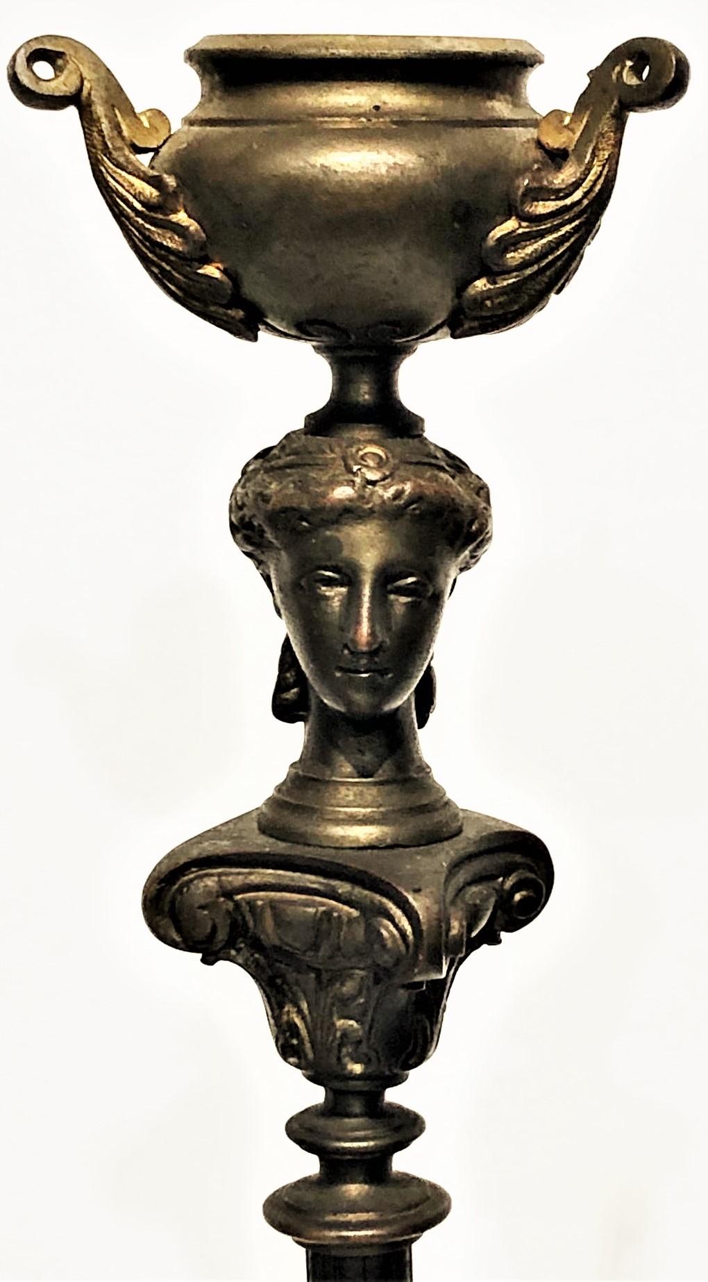 Grand Tour 
Pair of Bronze Candelabras
Late 19th Century

DIMENSIONS
Height: 10.33 inches
Width: 4.75 inches
Depth: 4.75 inches

ABOUT
We present to your attention a pair of stunning table candlesticks in the neo-classical Grand Tour style. They are