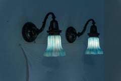 A Pair of Bronze Sconces with Blue/White Kokomo Co. Glass Shades ca. 1910