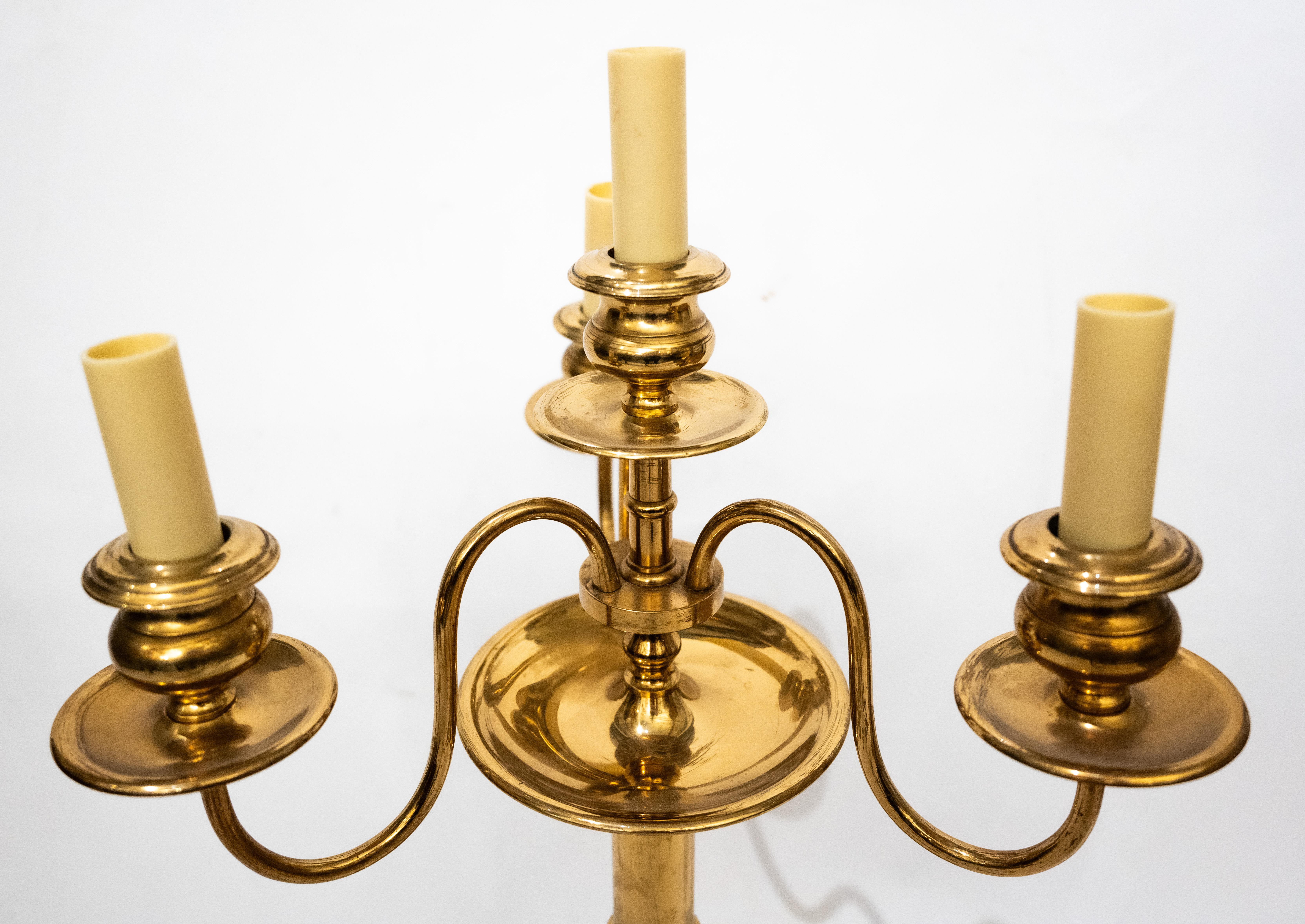 A Pair of Bronze Swedish Skultuna Four-Light Candle  Sticks In Good Condition For Sale In New York, NY
