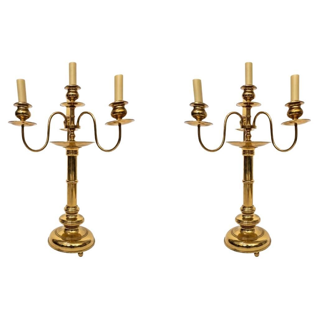 Paire de bougies suédoises Skultuna à quatre lumières en bronze  Bâtons