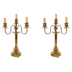 Paire de bougies suédoises Skultuna à quatre lumières en bronze  Bâtons