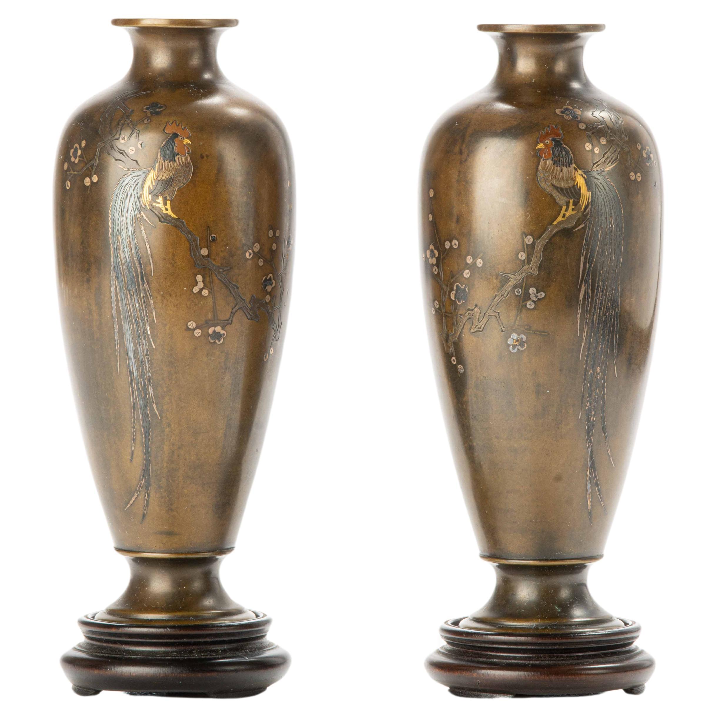 A pair of bronze vases with Onagadori roosters