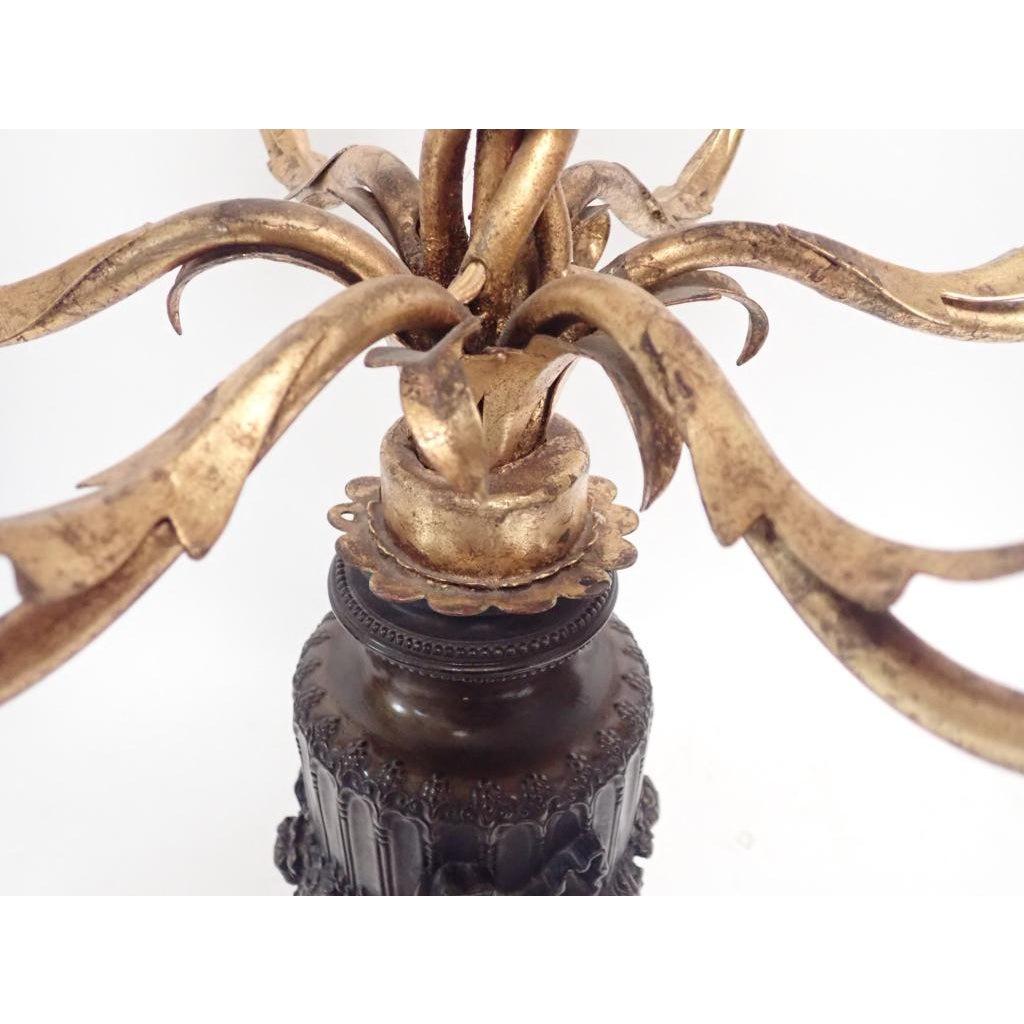 A Pair of Bronzed and Gilt Candelabra 1