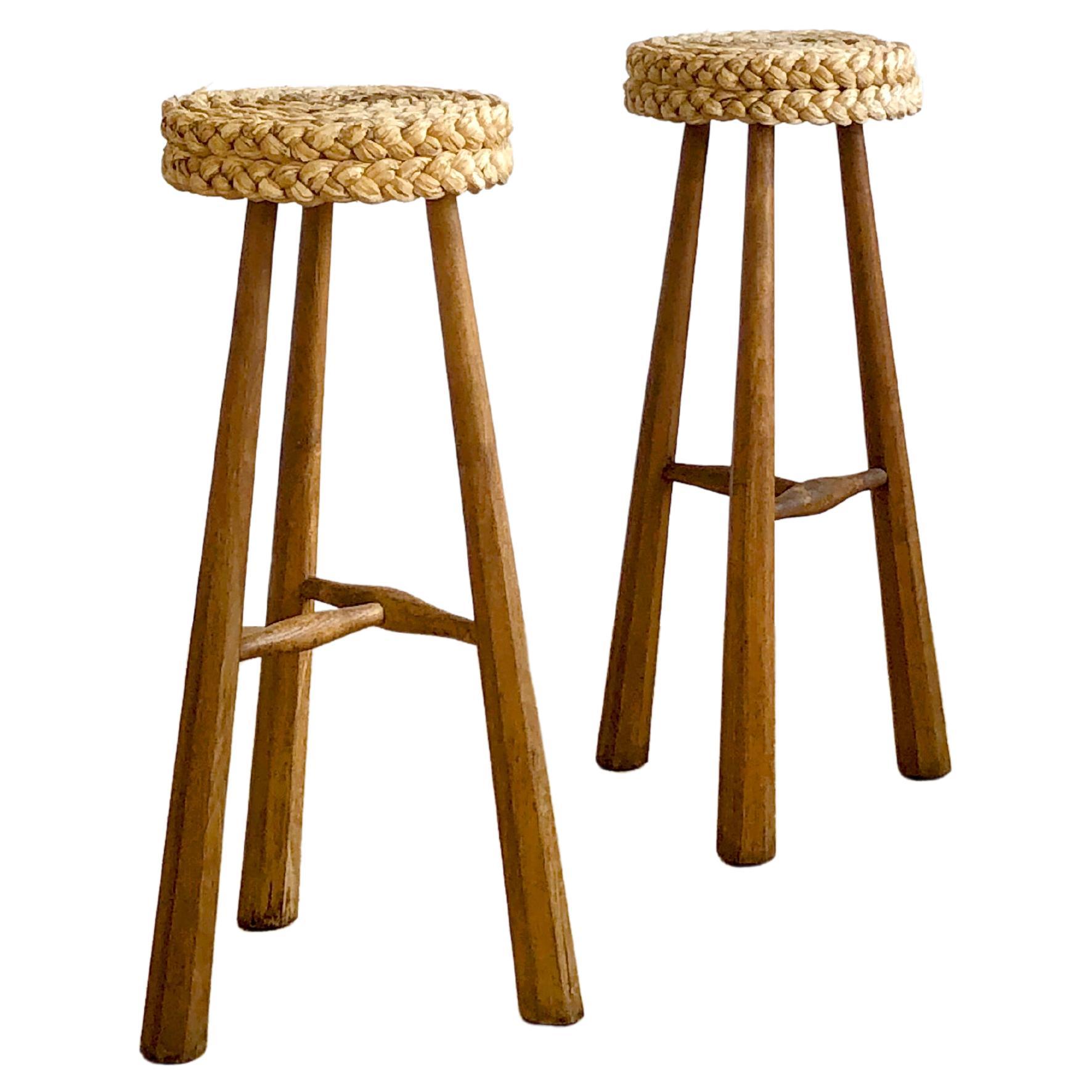 A PAIR OF BRUTALIST BAR STOOLS by AUDOUX-MINNET, France, 1950