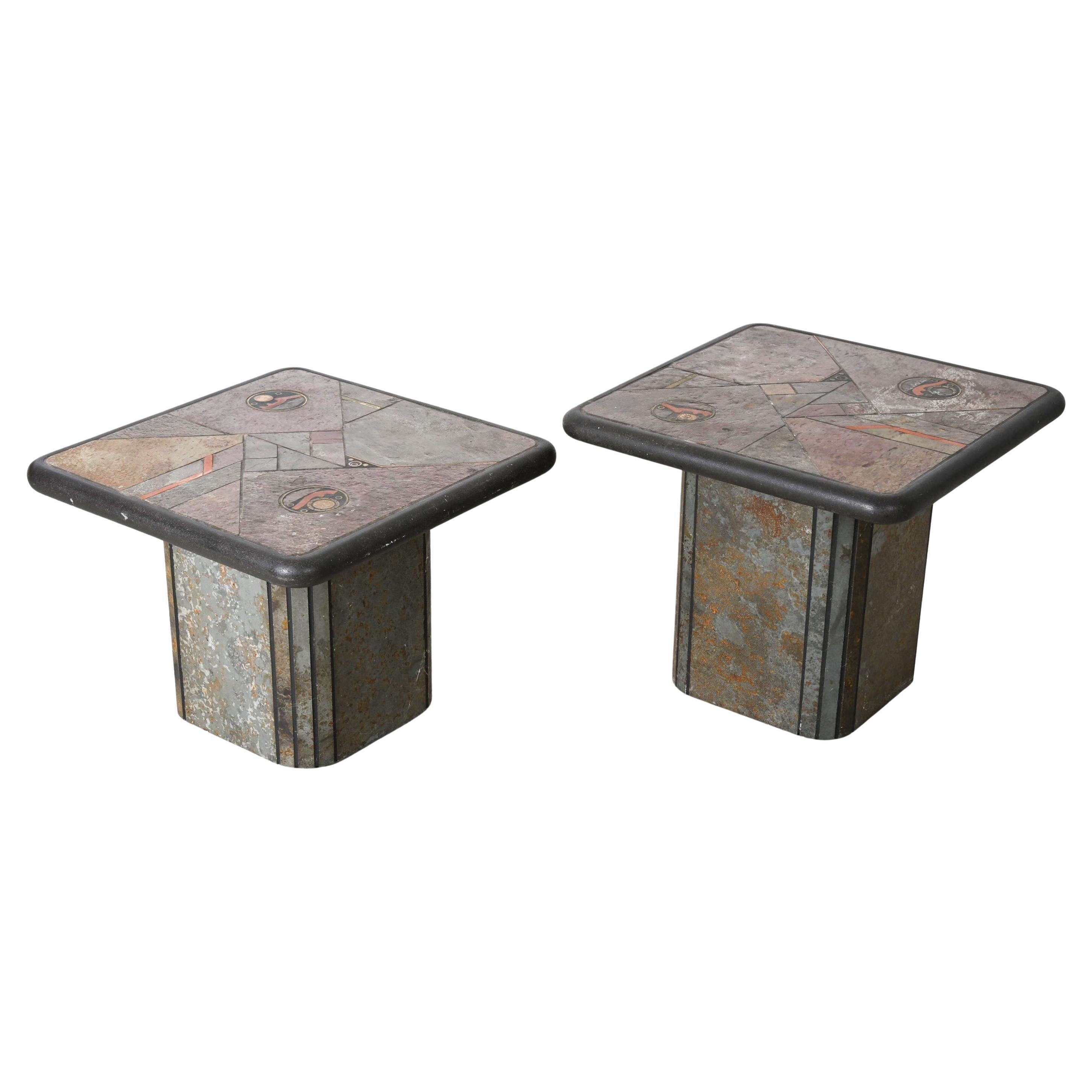A pair of slate cocktail or coffee table signed by Paul Kingma .
The tabletop with red and grey colors create a beautiful composition within an asymmetric design with Inlayed brass coins
The tabletop measures 59x59cm and 45/50cm height.
Used but