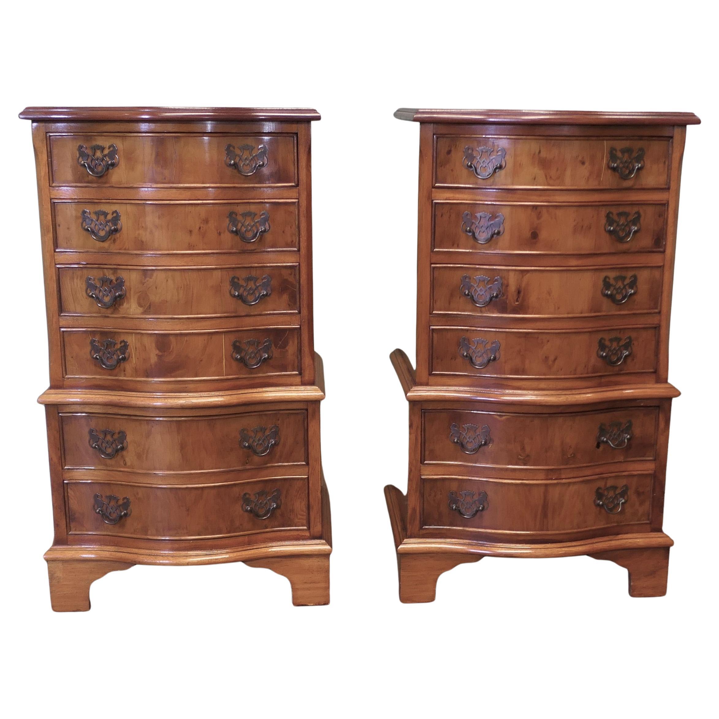
A Pair of Bur Yew Chest of Drawers

These are wonderful little chests, they are serpentine fronted  and designed like a chest on chest with 4 drawers at the top and 2 more below they have brass fittings
The drawers run very smoothly and they stand