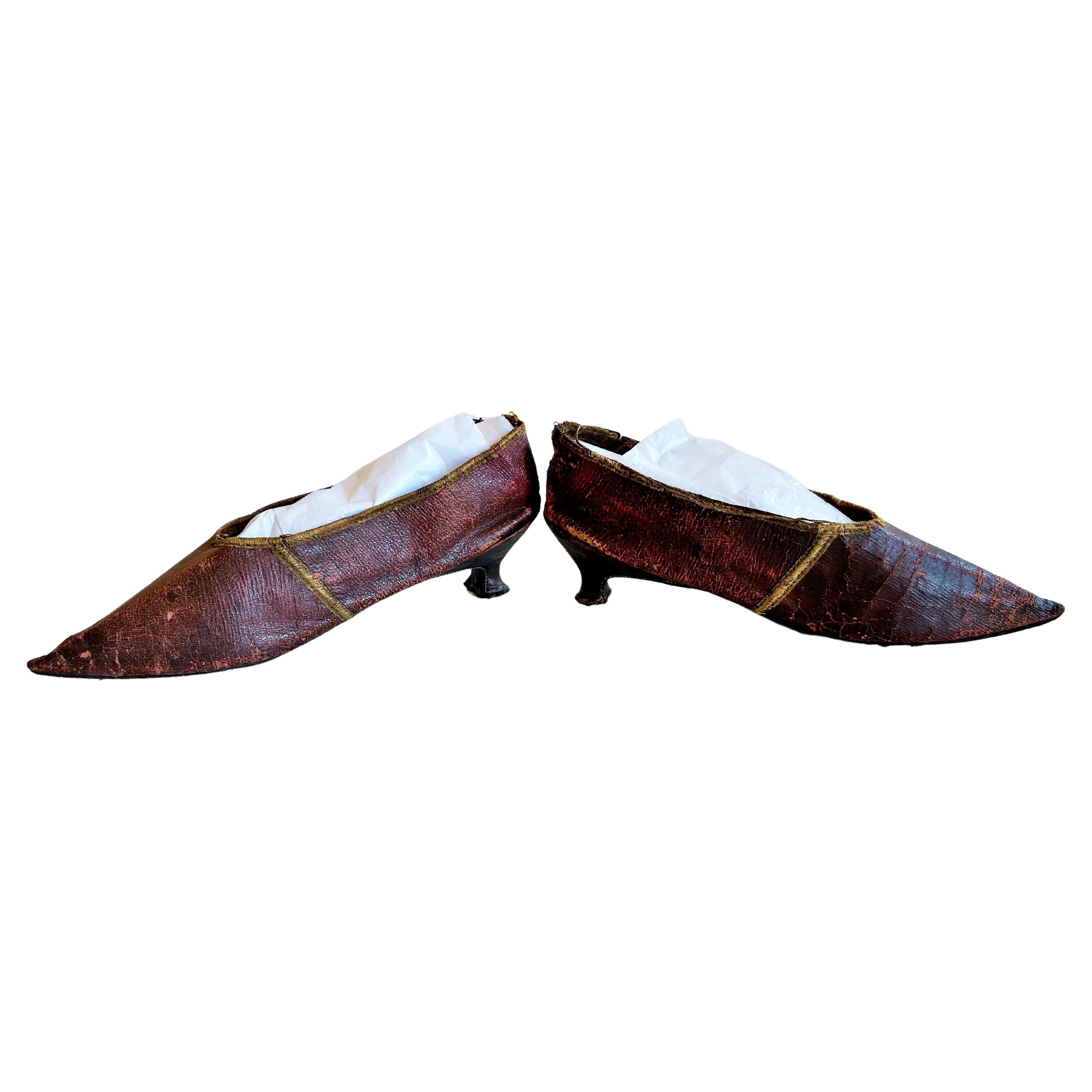 A pair of burgundy leather shoes Circa 1790-1800 For Sale