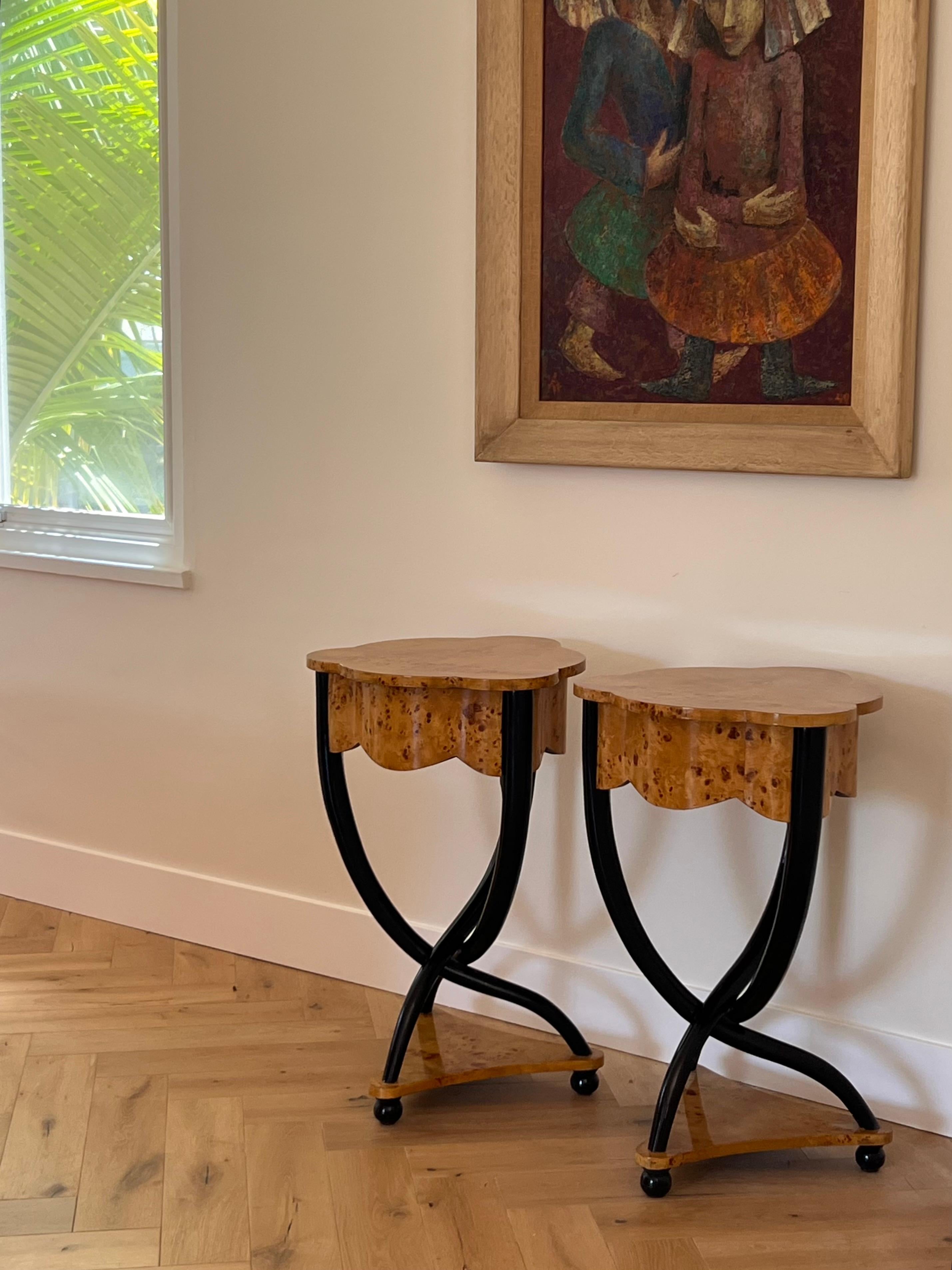 A pair of unique burl and ebonized wood Biedermeier side tables, probably 20th century. Little is known about these tables, other than they came from the estate of a collector of art and design, as well as myriad antiques. Each has a drawer that